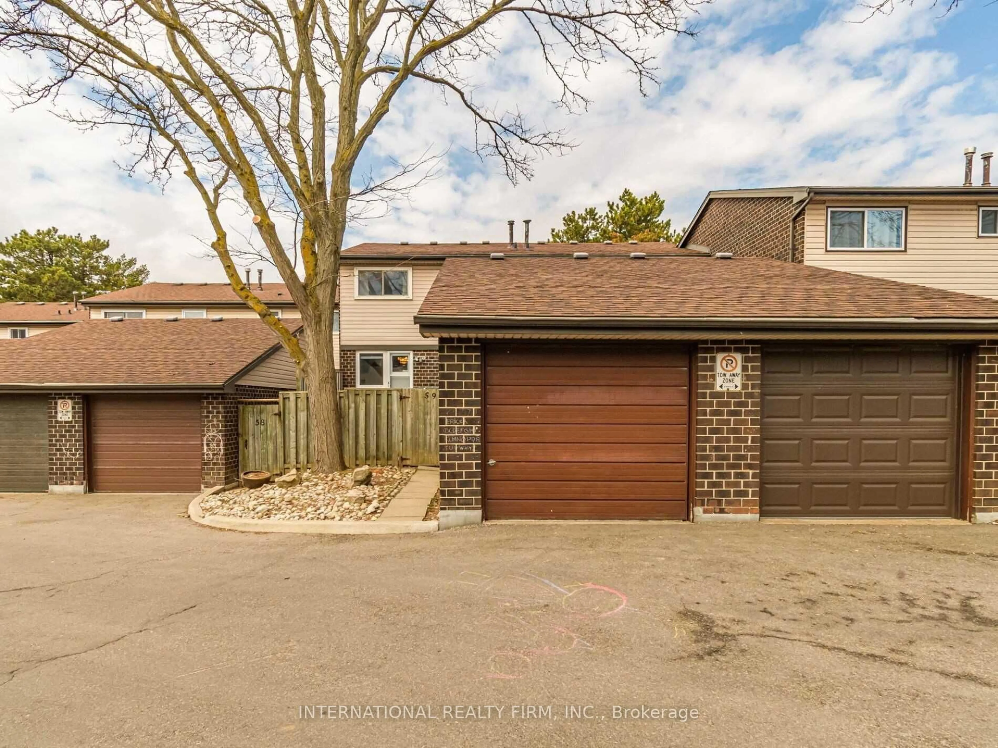 A pic from outside/outdoor area/front of a property/back of a property/a pic from drone, street for 318 Laurier Ave #59, Milton Ontario L9T 3M9