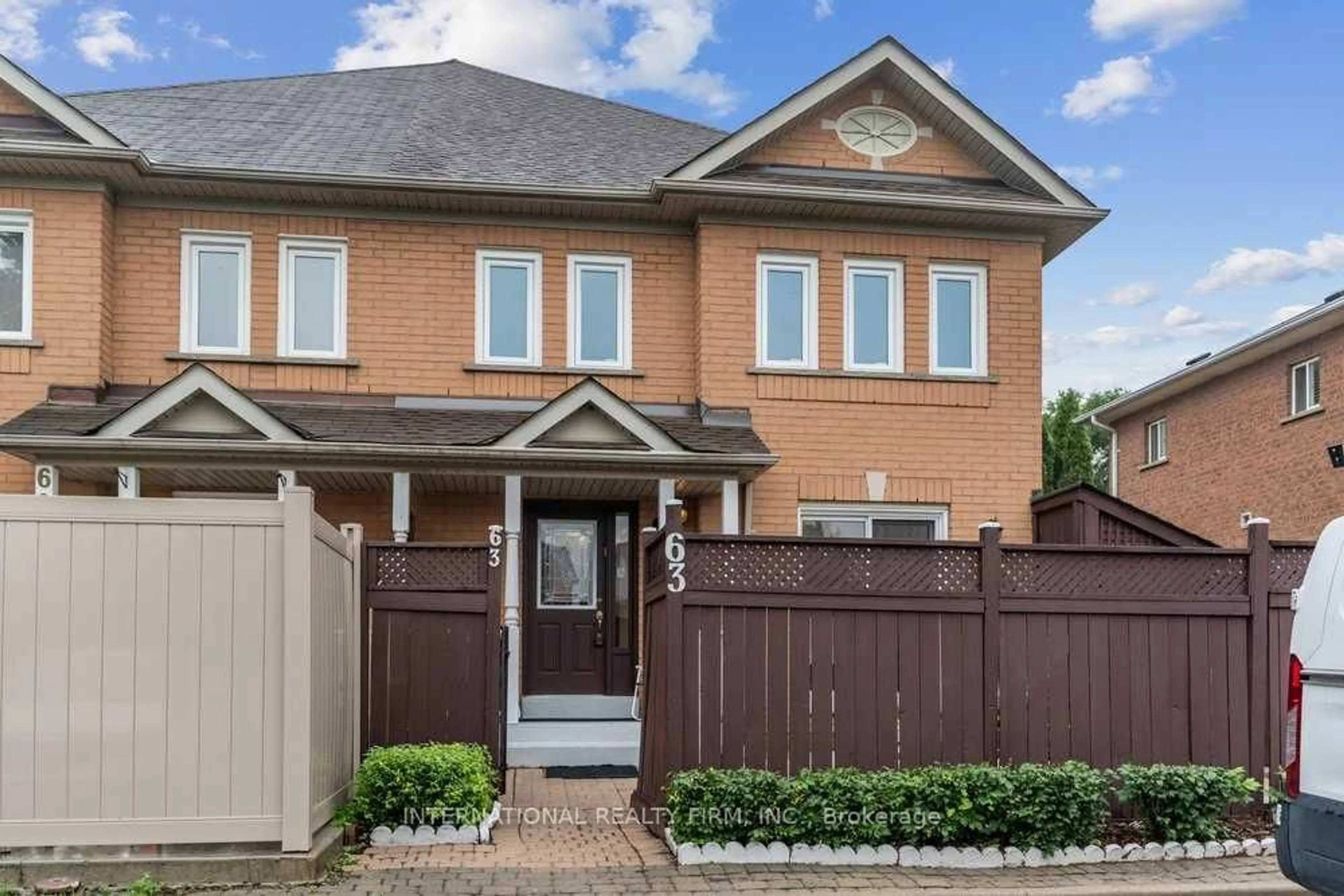 Home with brick exterior material, street for 63 Pressed Brick Dr, Brampton Ontario L6V 4K5