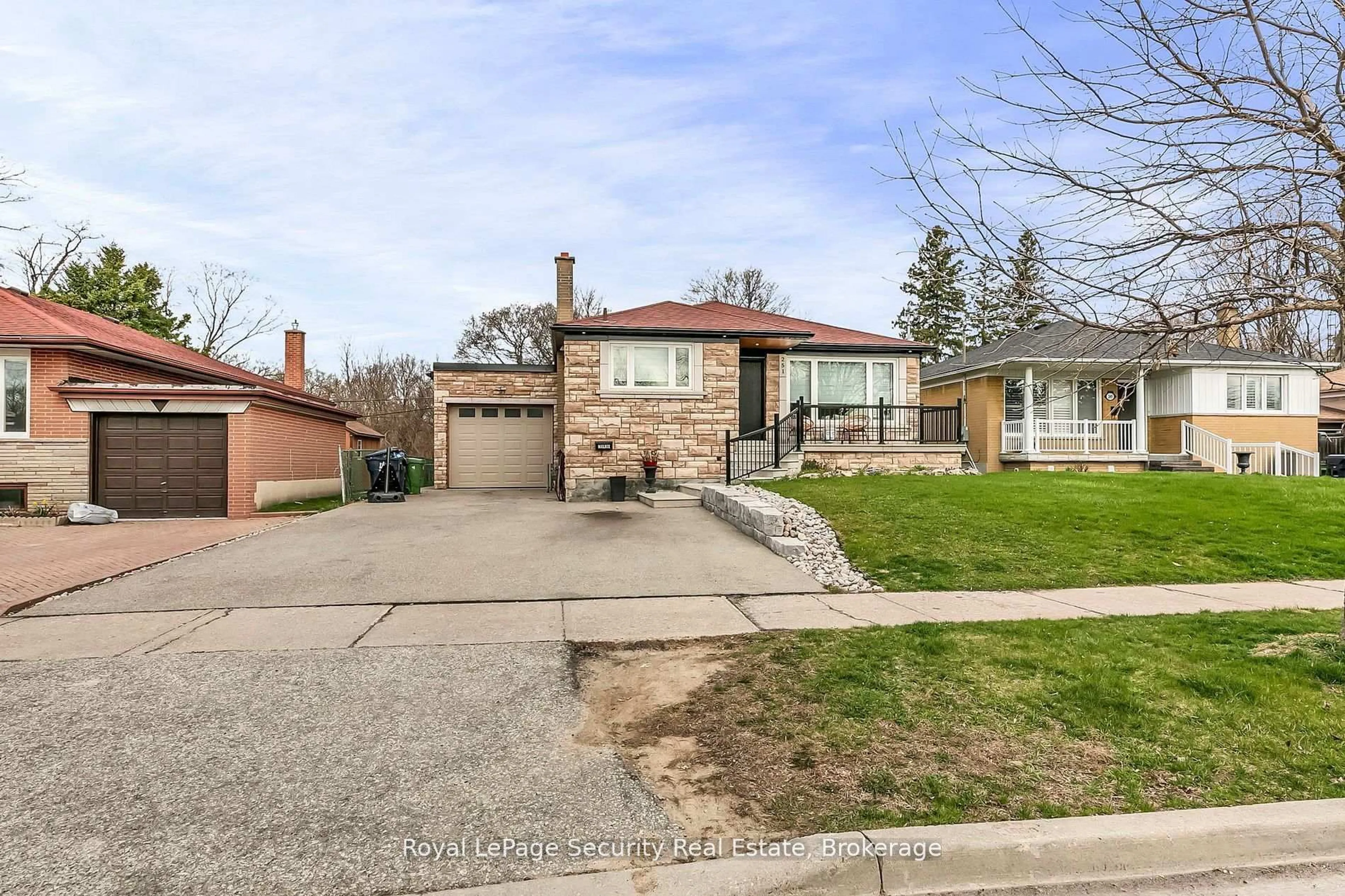 Home with brick exterior material, street for 251 Thistle Down Blvd, Toronto Ontario M9V 1K6