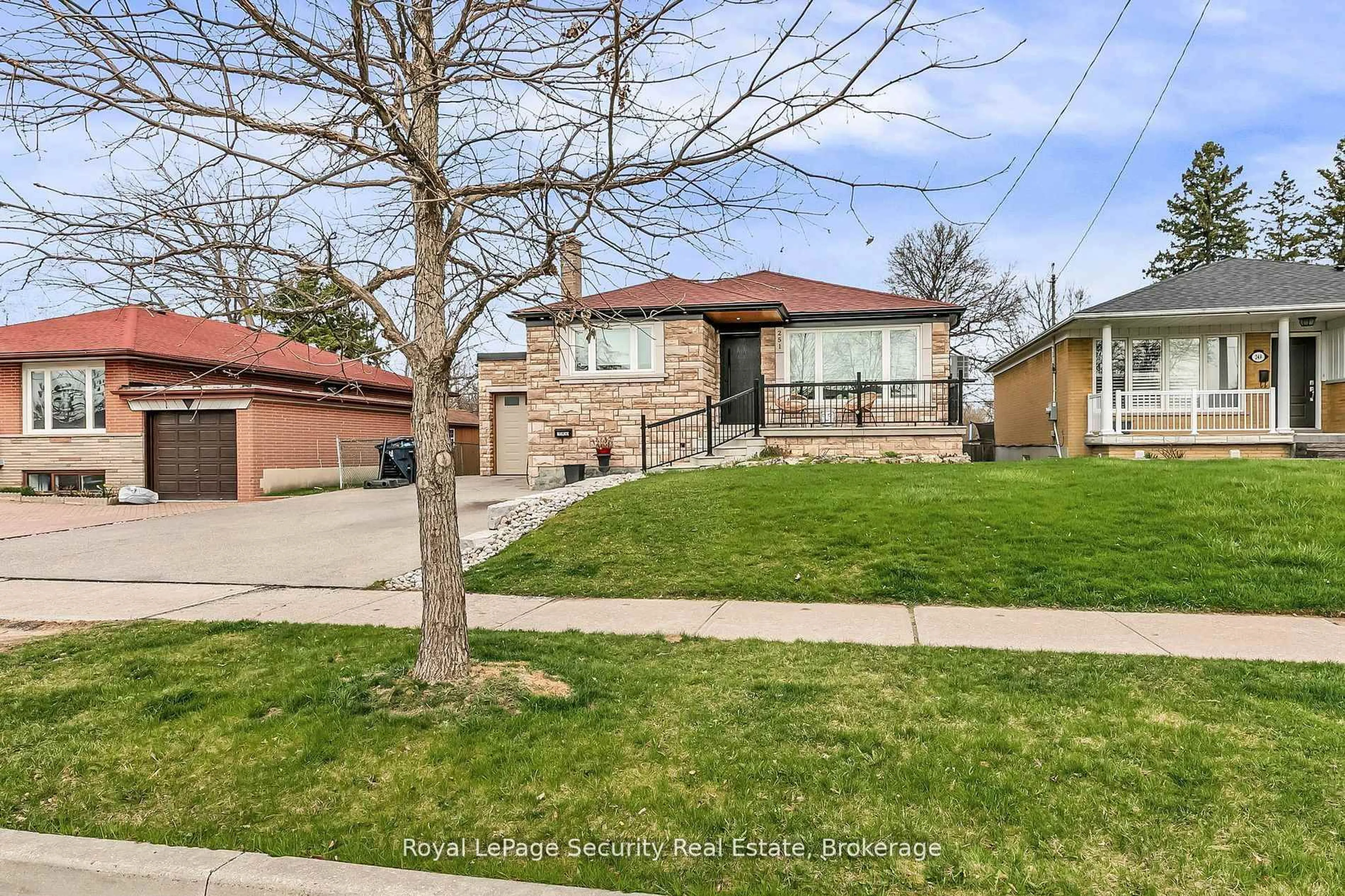 Home with brick exterior material, street for 251 Thistle Down Blvd, Toronto Ontario M9V 1K6