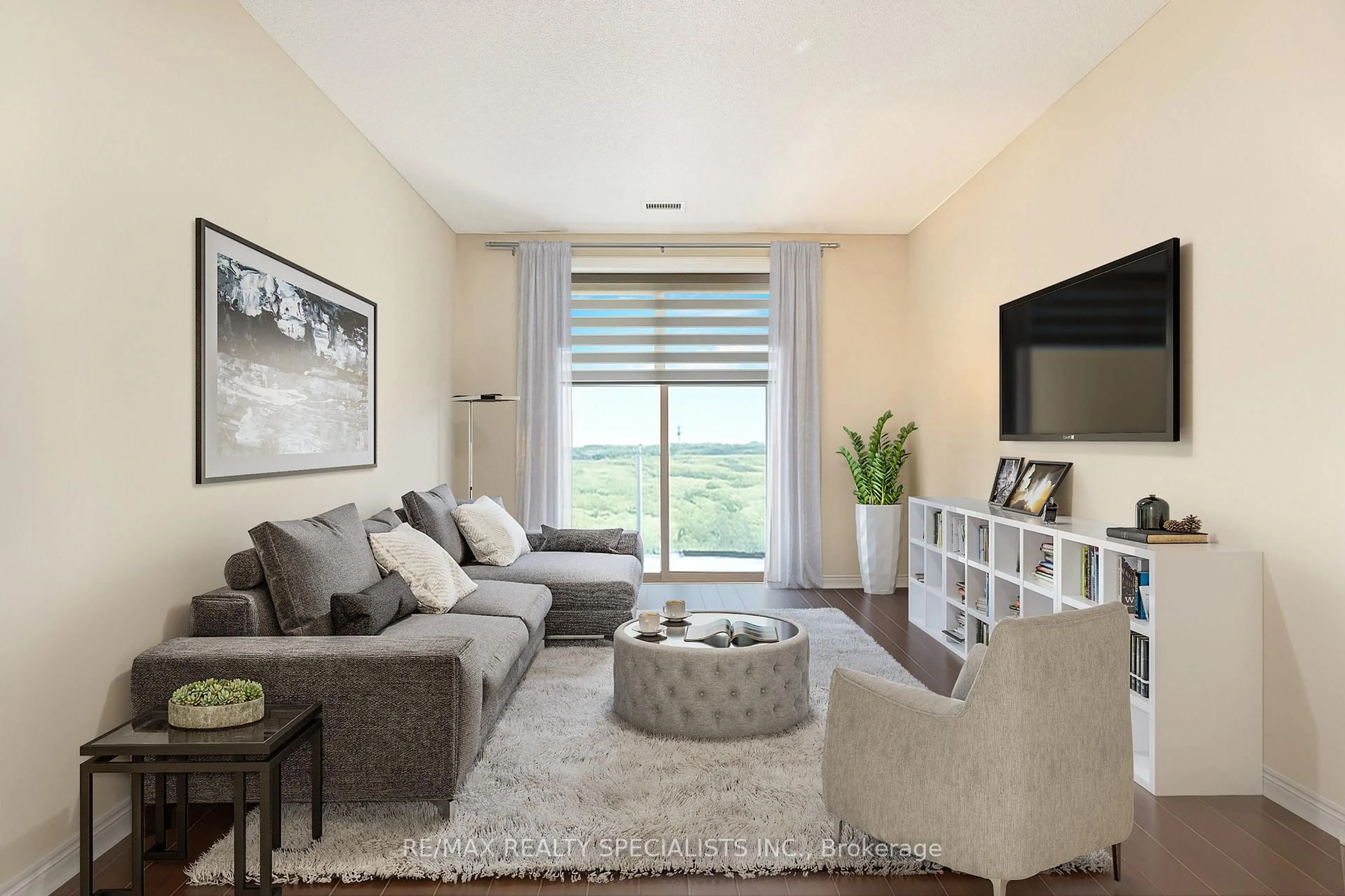 Living room with furniture, unknown for 33 Whitmer St #609, Milton Ontario L9T 8P9