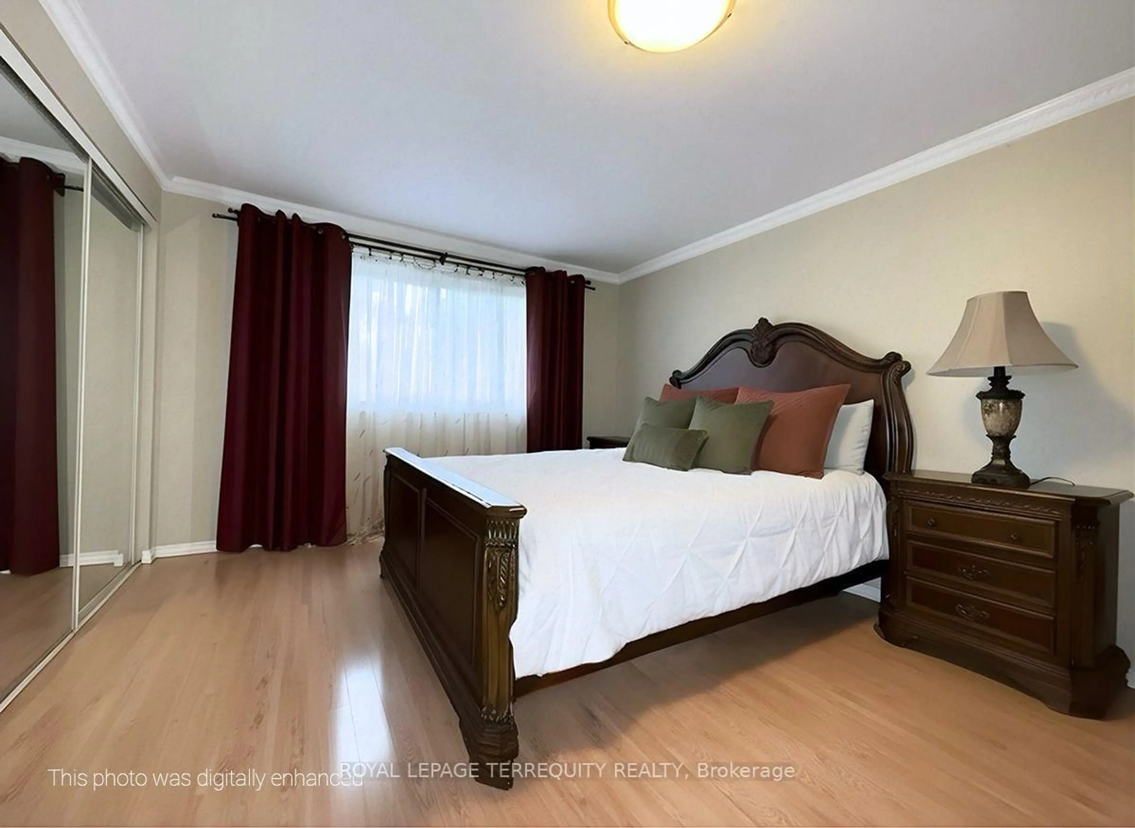 Bedroom with bed, wood/laminate floor for 1704 Oberon Cres, Mississauga Ontario L4X 2K8
