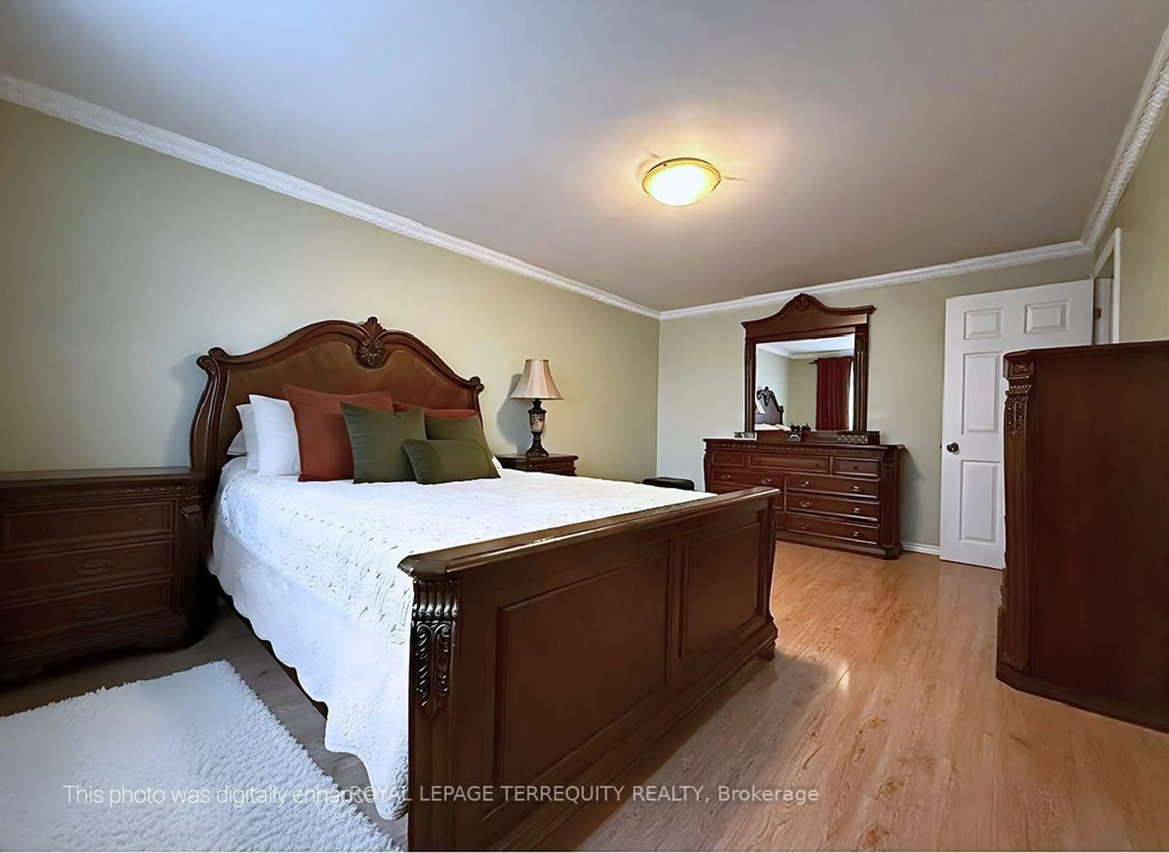 Bedroom with bed, wood/laminate floor for 1704 Oberon Cres, Mississauga Ontario L4X 2K8