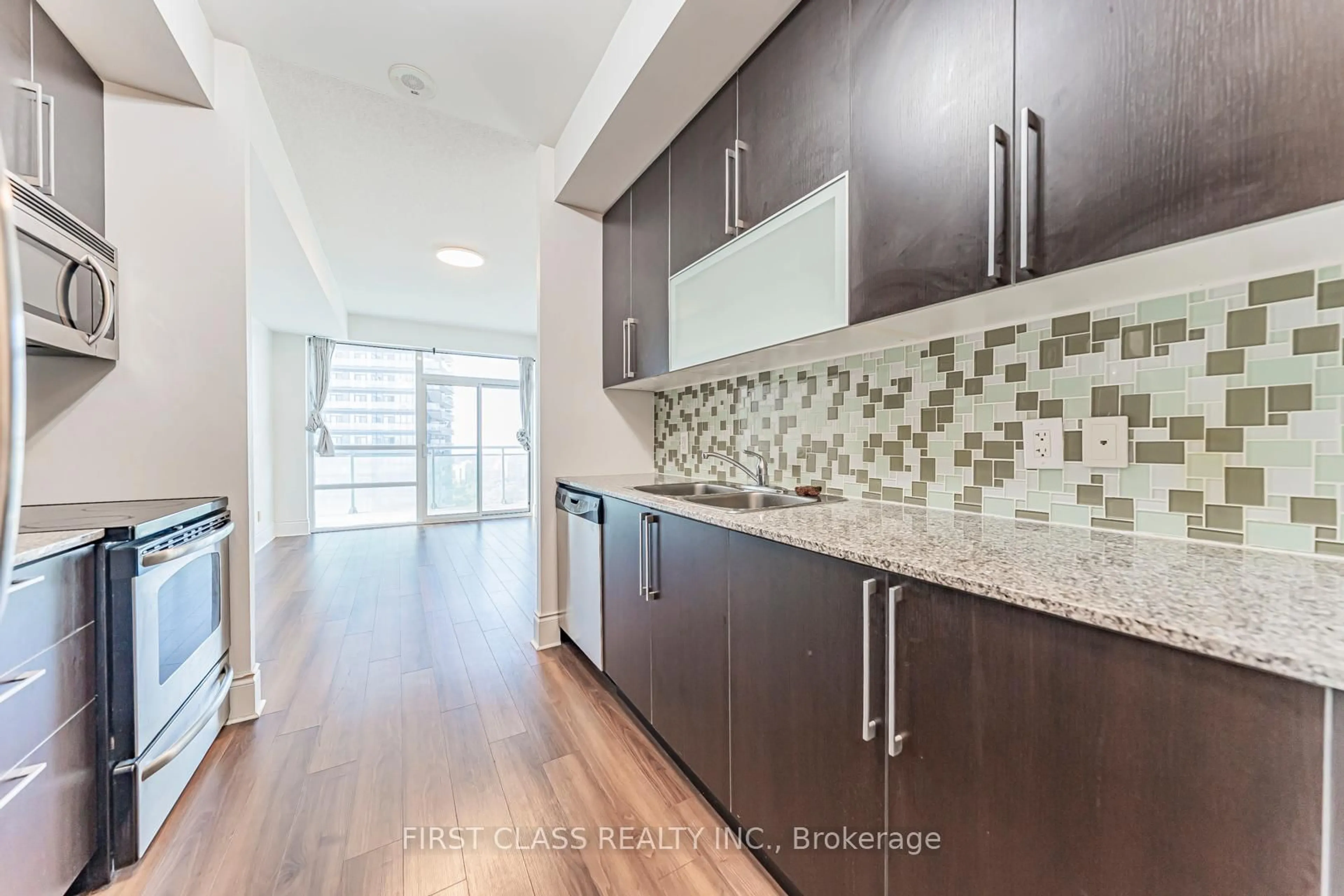 Open concept kitchen, unknown for 16 Brookers Lane #2410, Toronto Ontario M8V 0A5