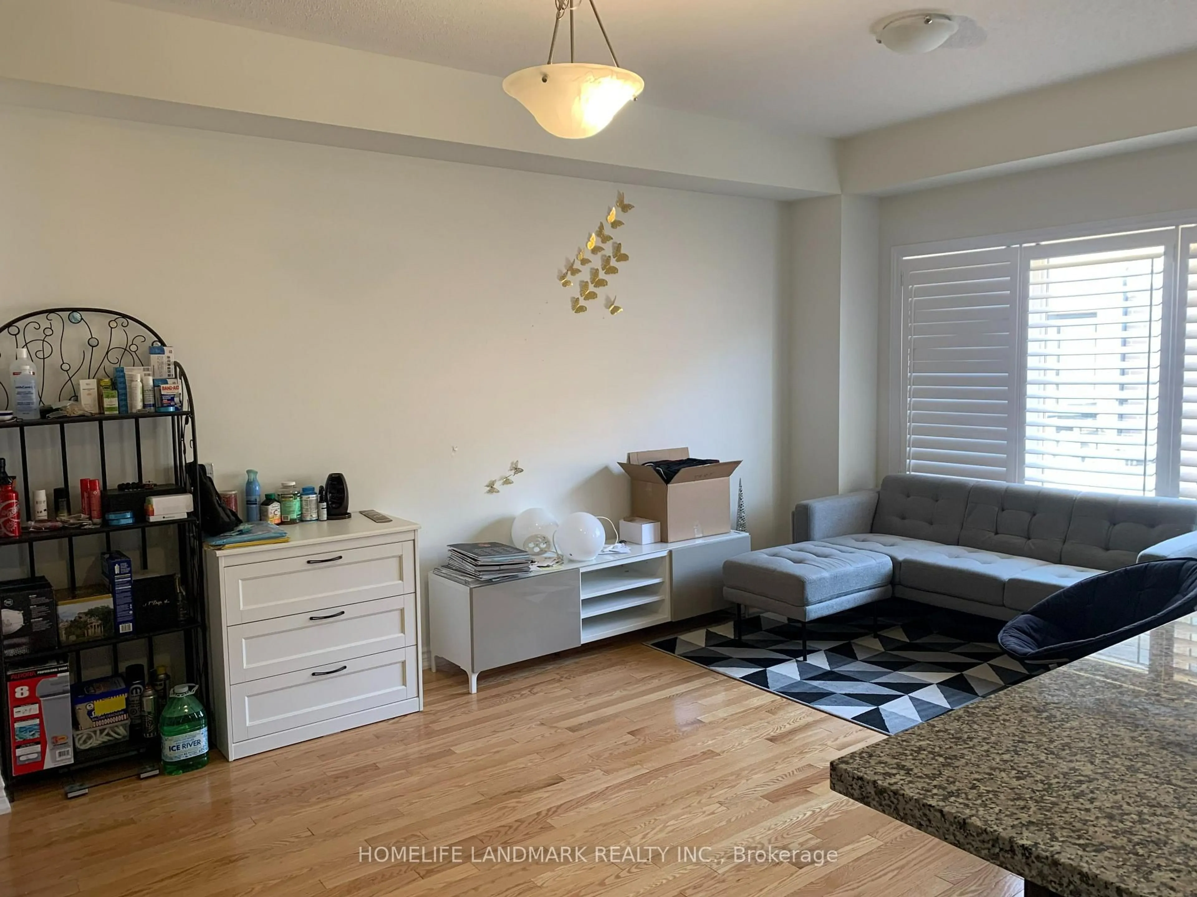 Living room with furniture, wood/laminate floor for 395 Athabasca Common, Oakville Ontario L6H 0R5