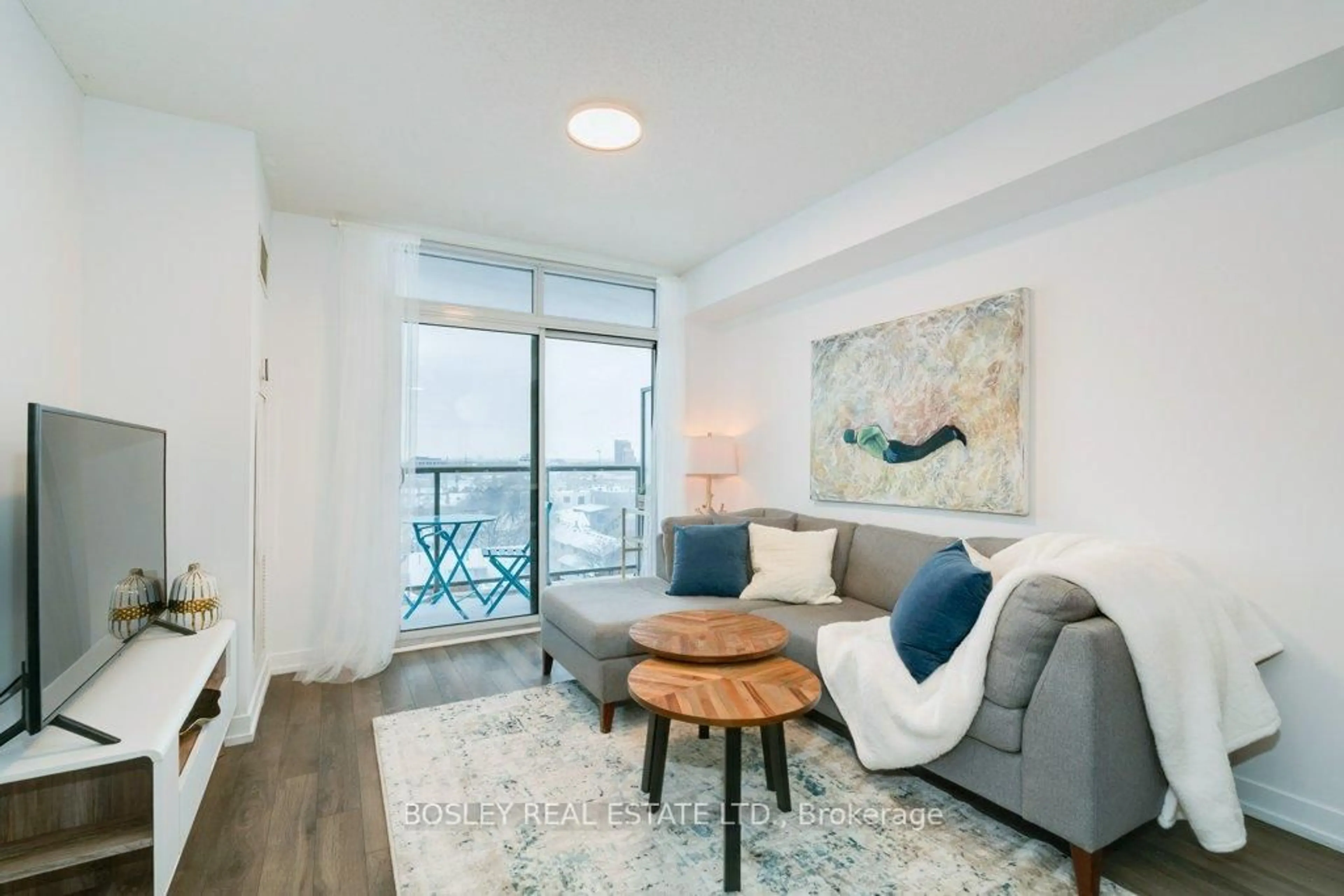 Living room with furniture, wood/laminate floor for 812 Lansdowne Ave #810, Toronto Ontario M6H 4K5