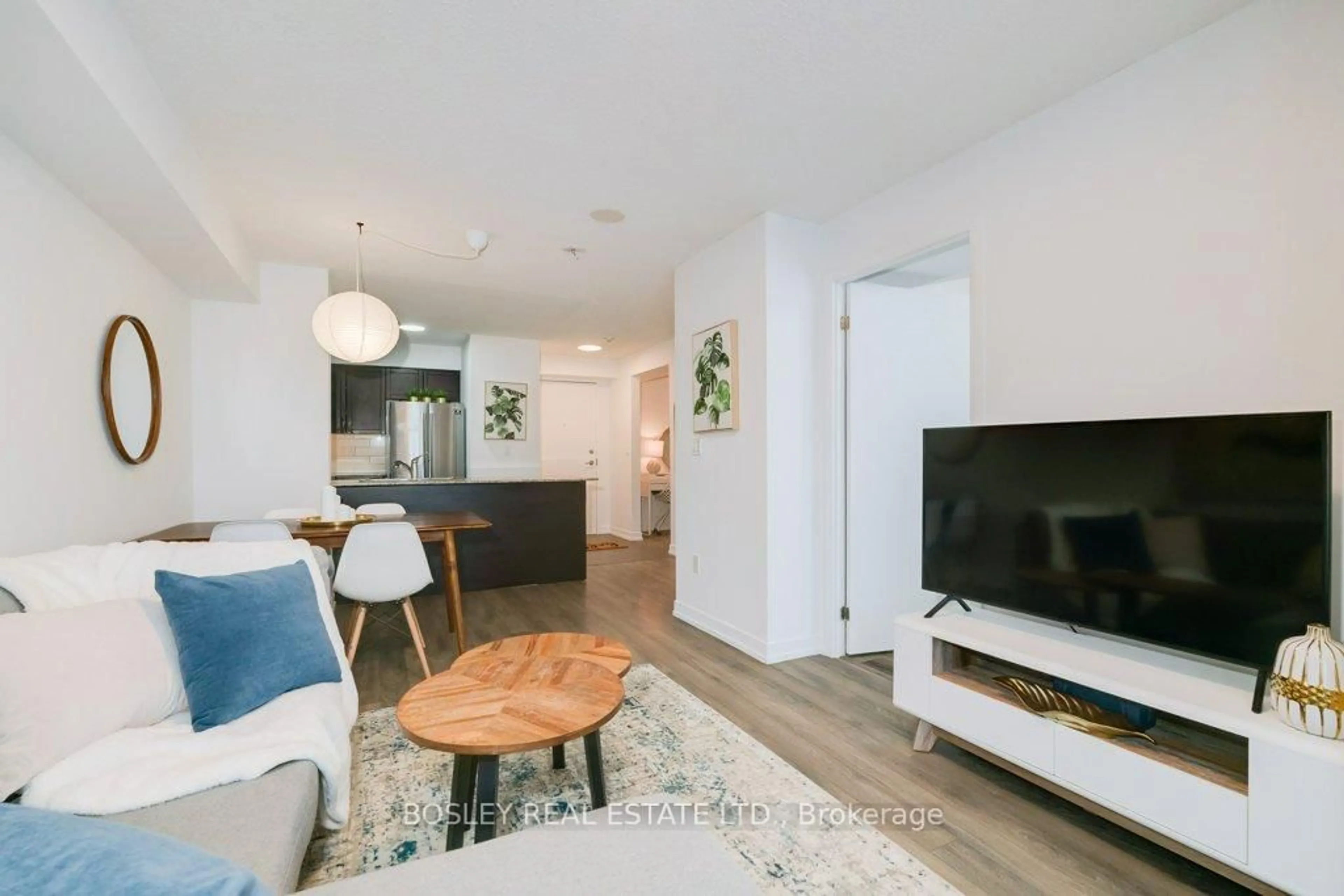 Living room with furniture, wood/laminate floor for 812 Lansdowne Ave #810, Toronto Ontario M6H 4K5