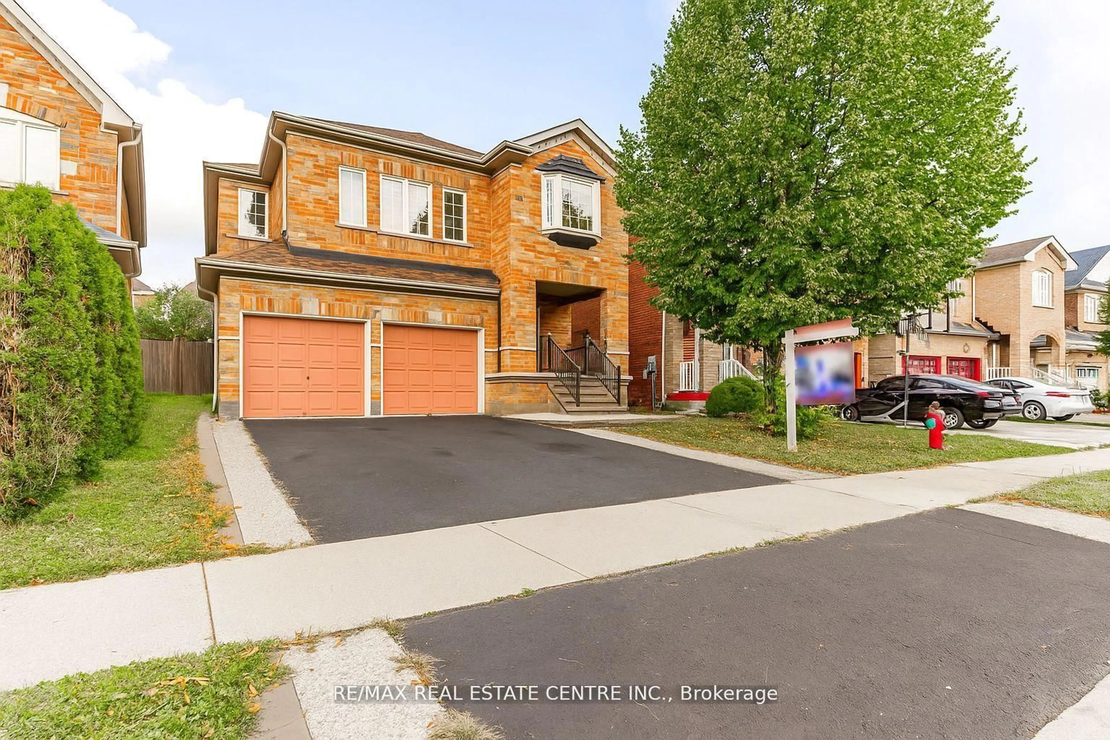 Home with brick exterior material, street for 107 Crown Victoria Dr, Brampton Ontario L7A 3X9
