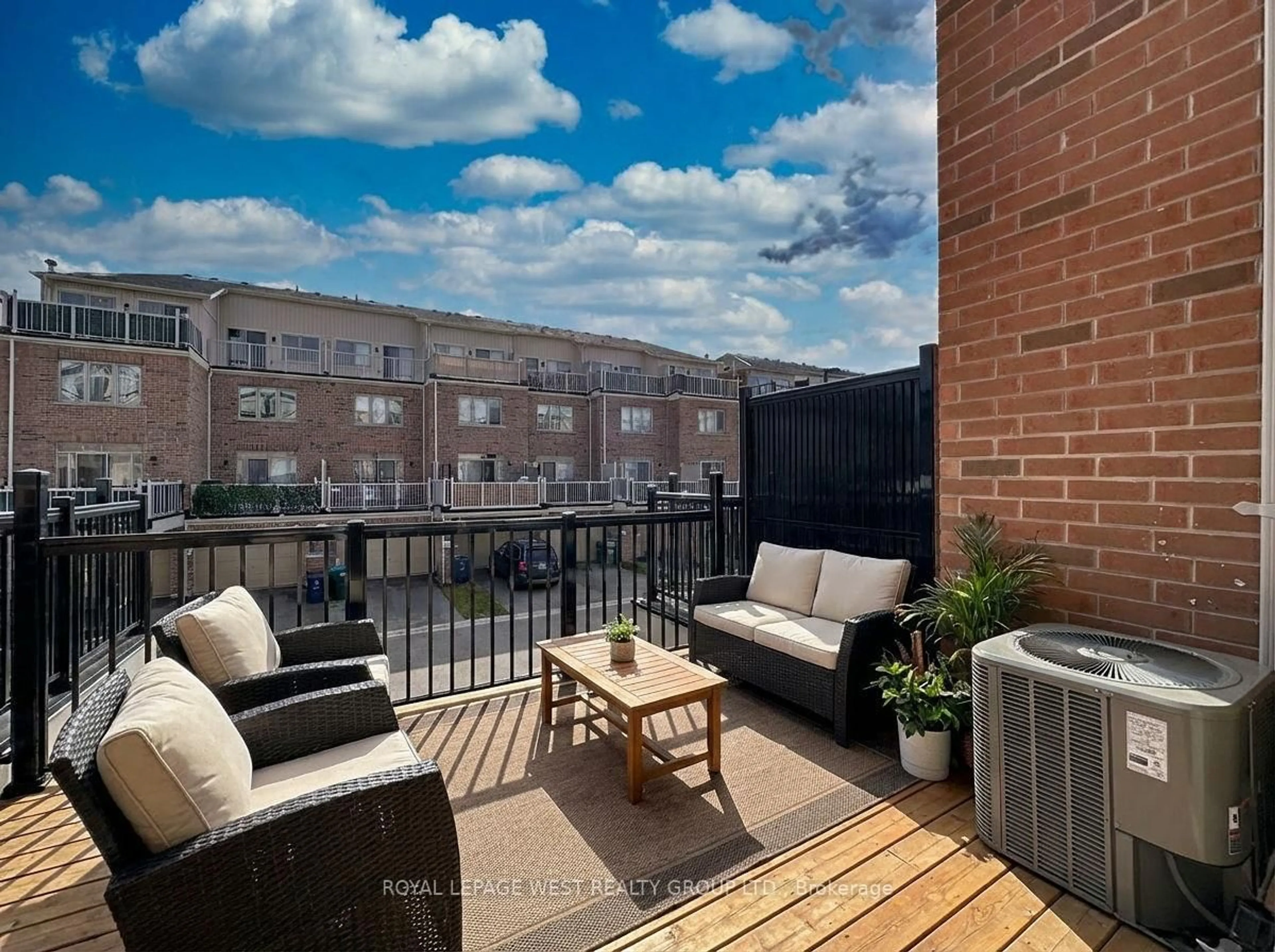 Patio, city buildings view from balcony for 159 Norseman St, Toronto Ontario M8Z 0E6