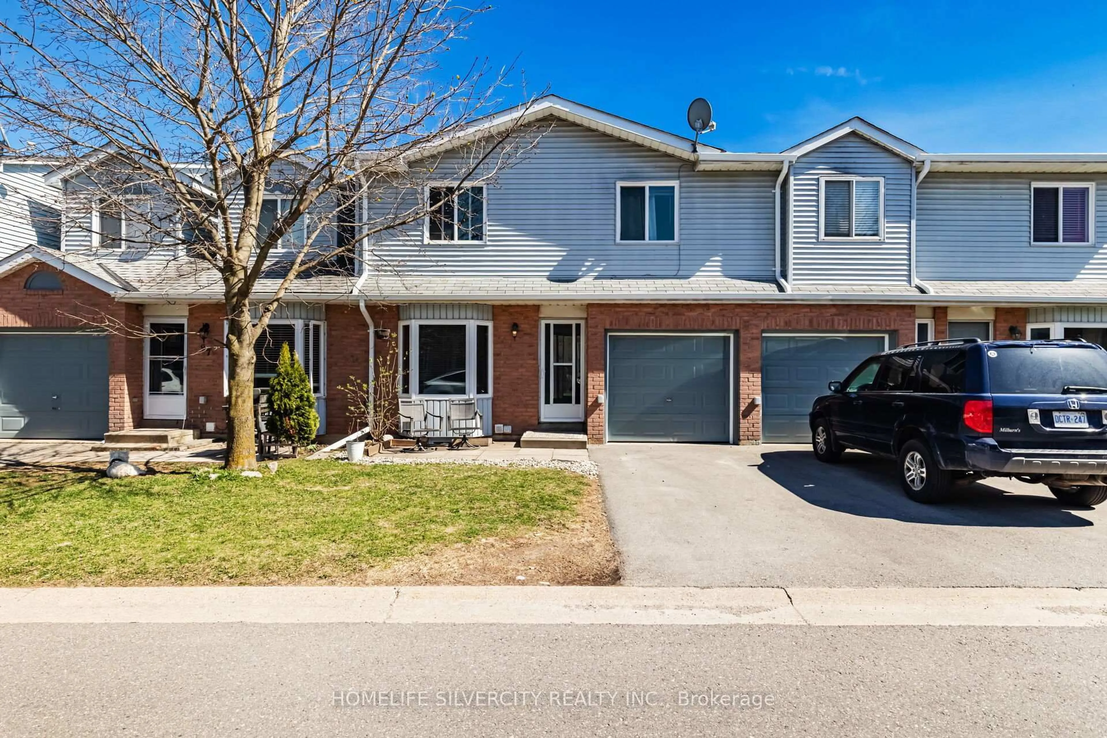 Home with brick exterior material, street for 90 Lawrence Ave #96, Orangeville Ontario L9W 4J5