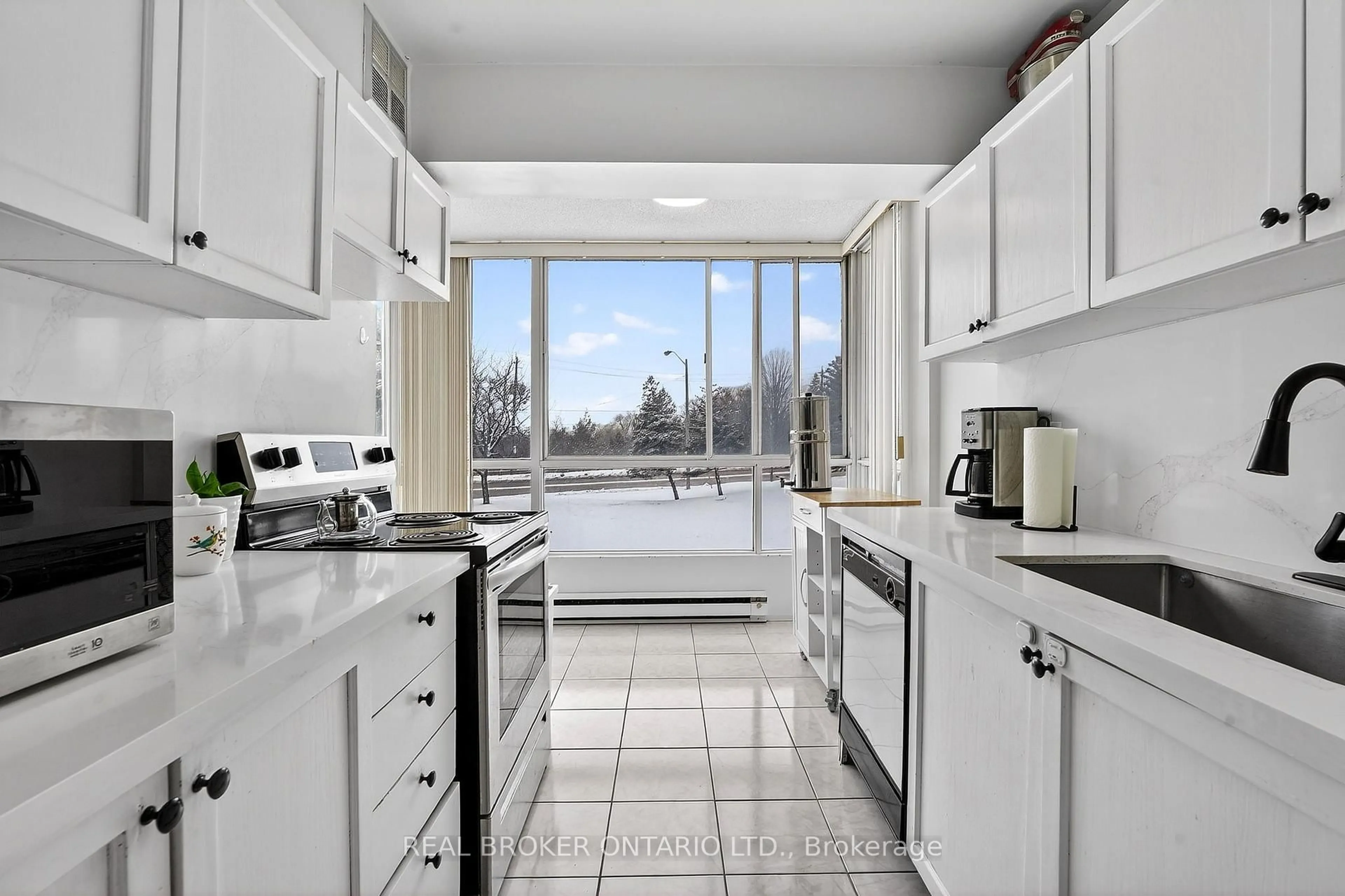 Standard kitchen, ceramic/tile floor for 3077 Weston Rd #208, Toronto Ontario M9M 3A1
