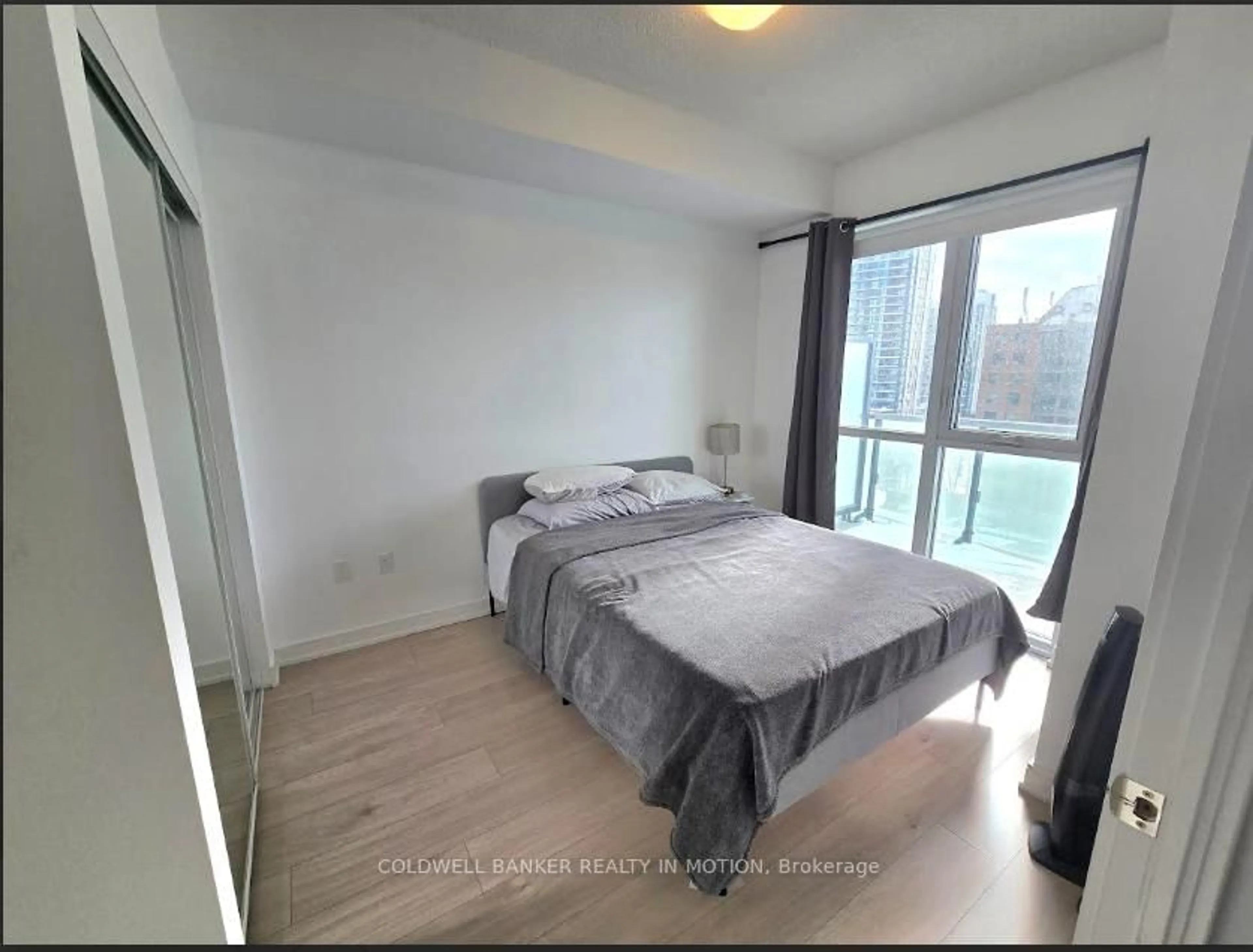 Bedroom with bed, wood/laminate floor for 8 Nahani Way #708, Mississauga Ontario L4Z 0C6