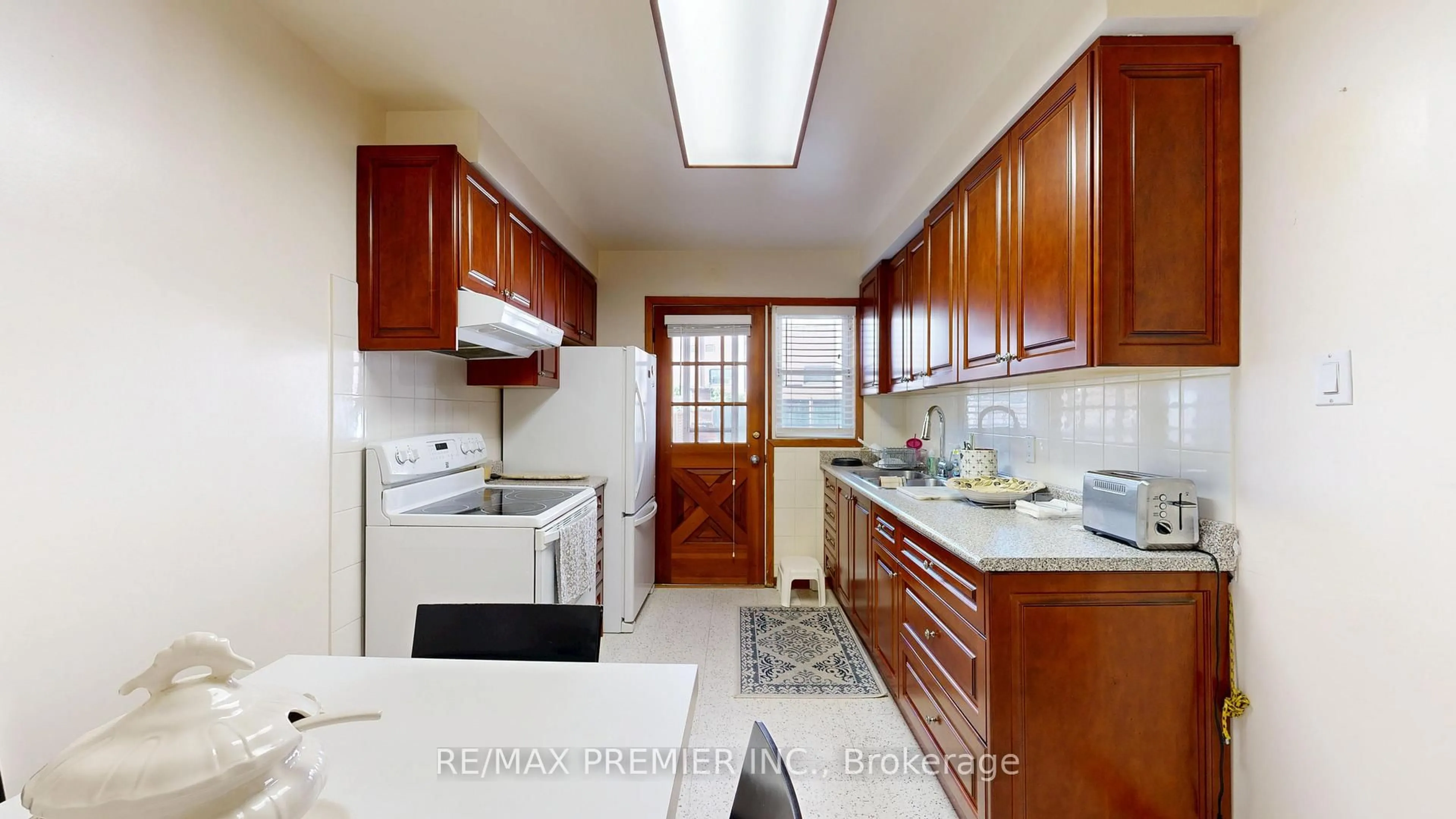 Standard kitchen, ceramic/tile floor for 12 Sonnet Crt, Toronto Ontario M6L 1J7