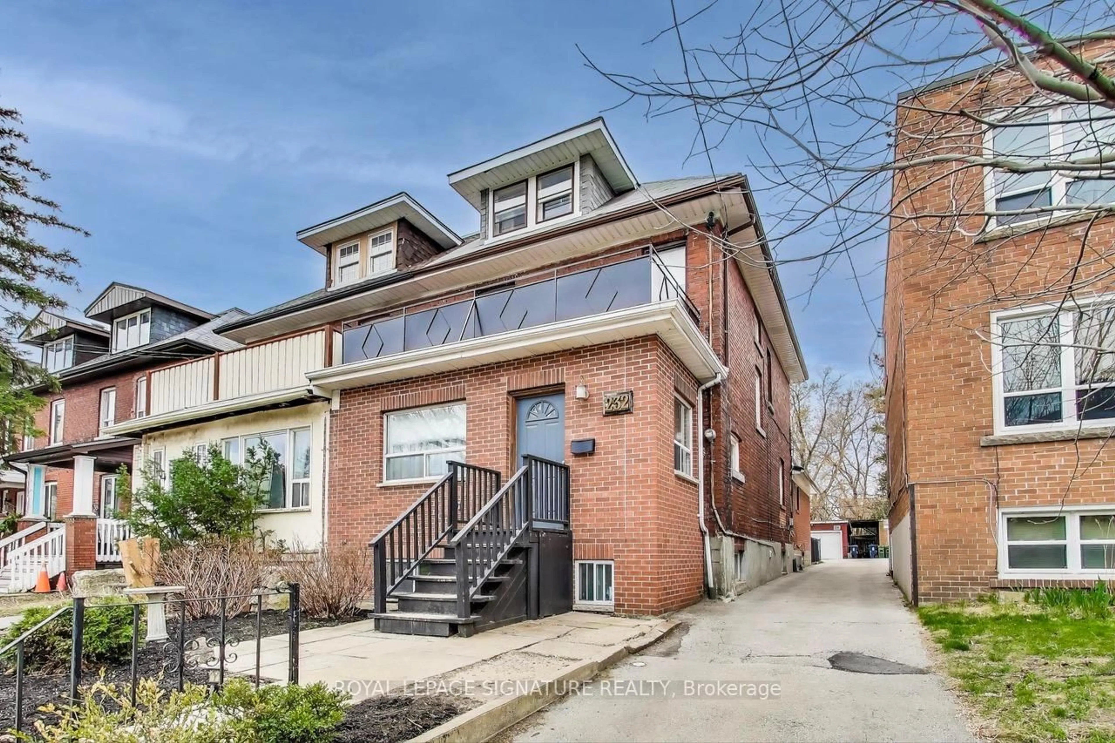 Home with brick exterior material, street for 232 Pacific Ave, Toronto Ontario M6P 2P5