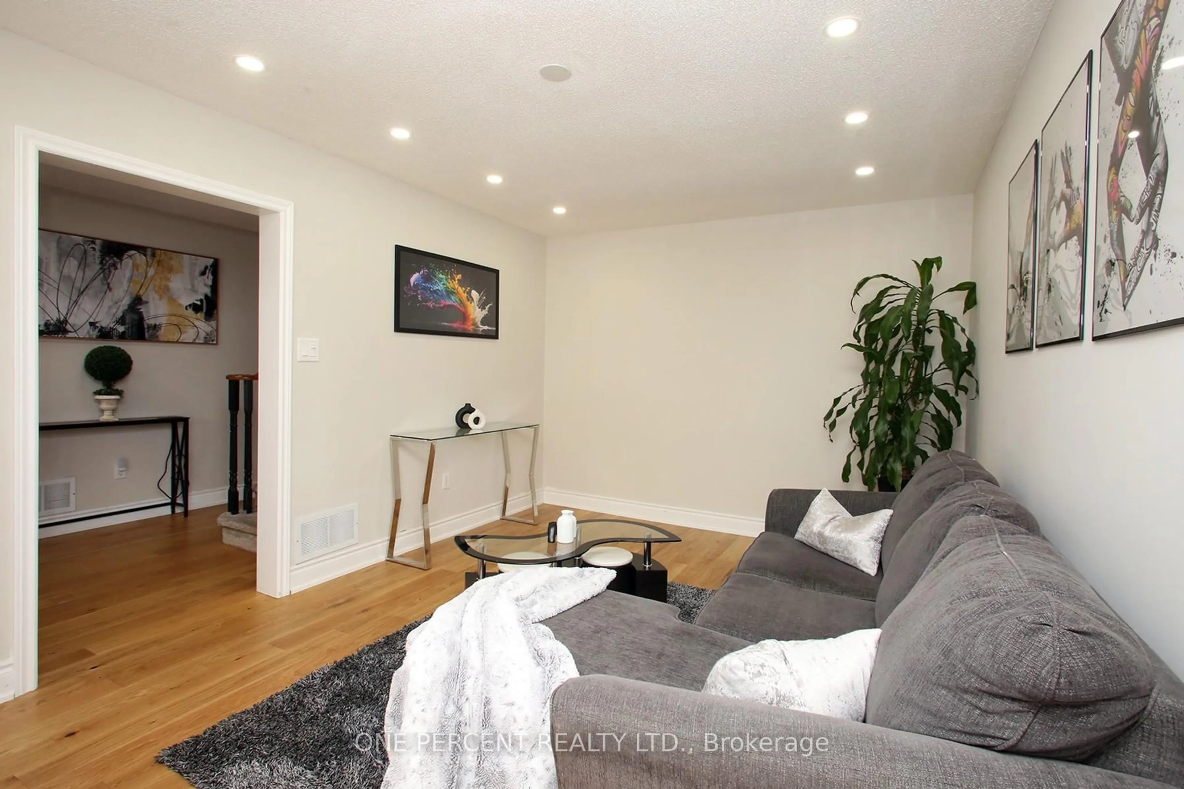 Living room with furniture, wood/laminate floor for 5 Watson Rd, Halton Hills Ontario L7G 5N8