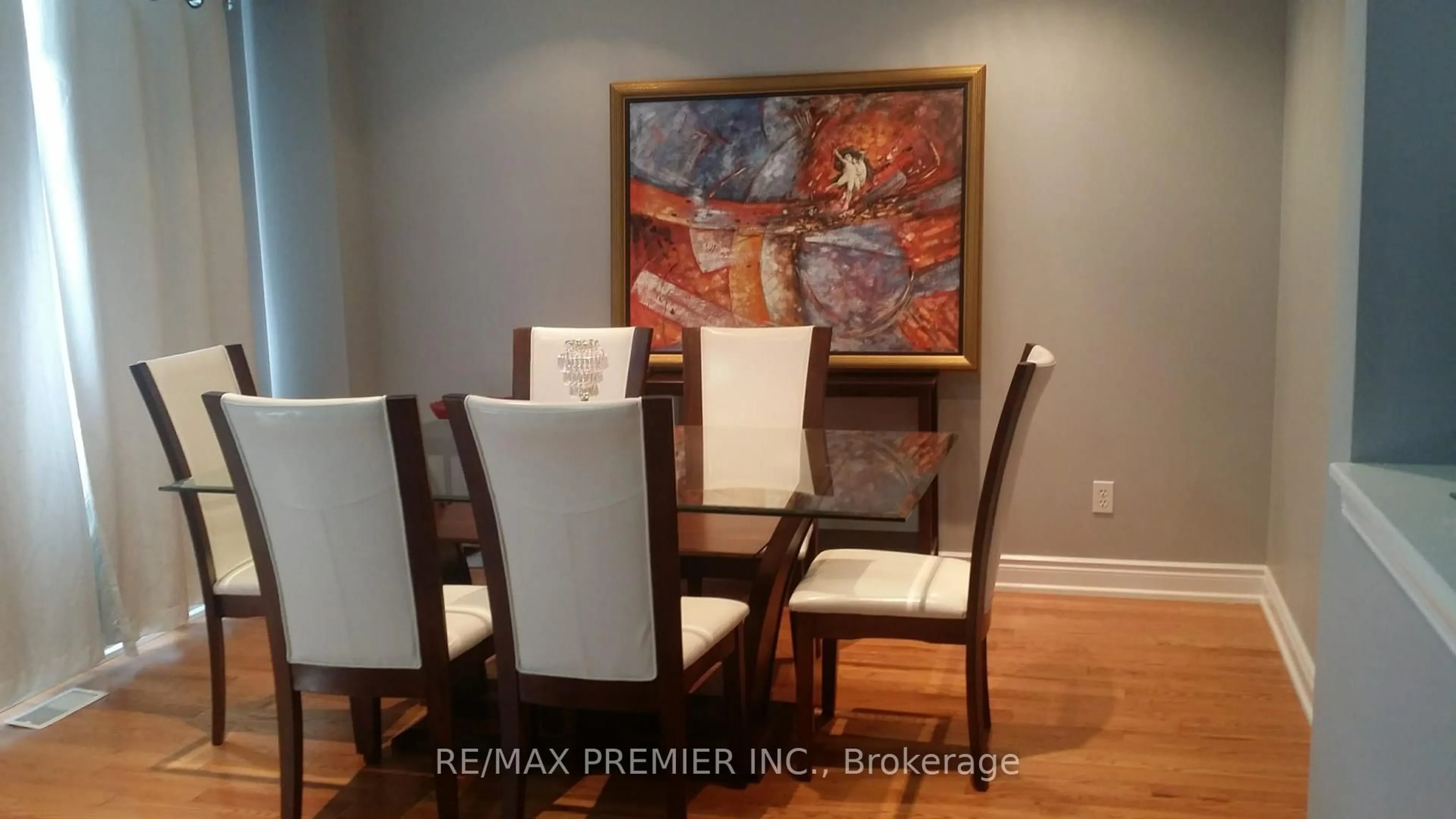 Dining room, wood/laminate floor for 5272 Brookwood Crt, Mississauga Ontario L5V 2N8