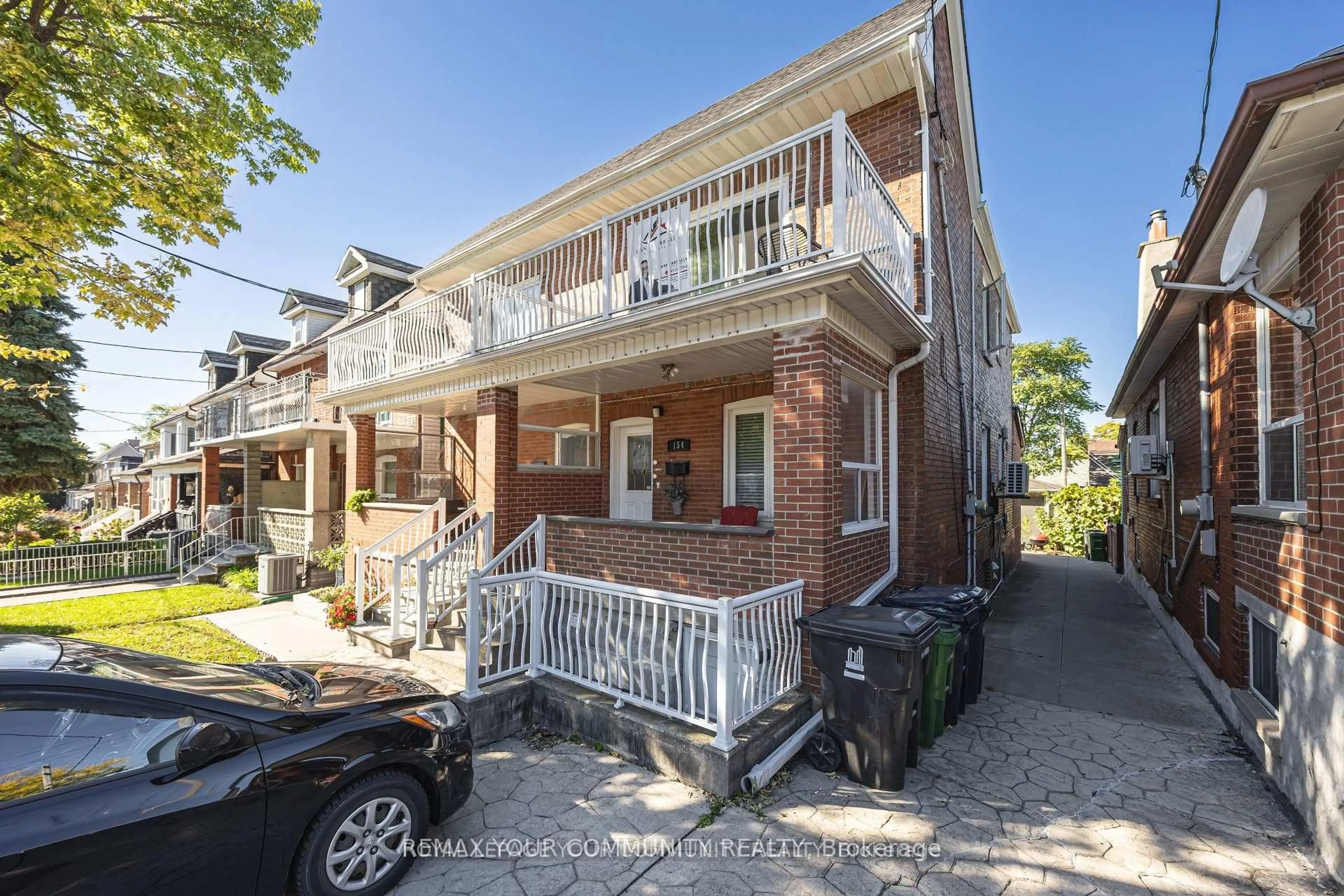Home with brick exterior material, street for 154 Day Ave, Toronto Ontario M6E 3W3