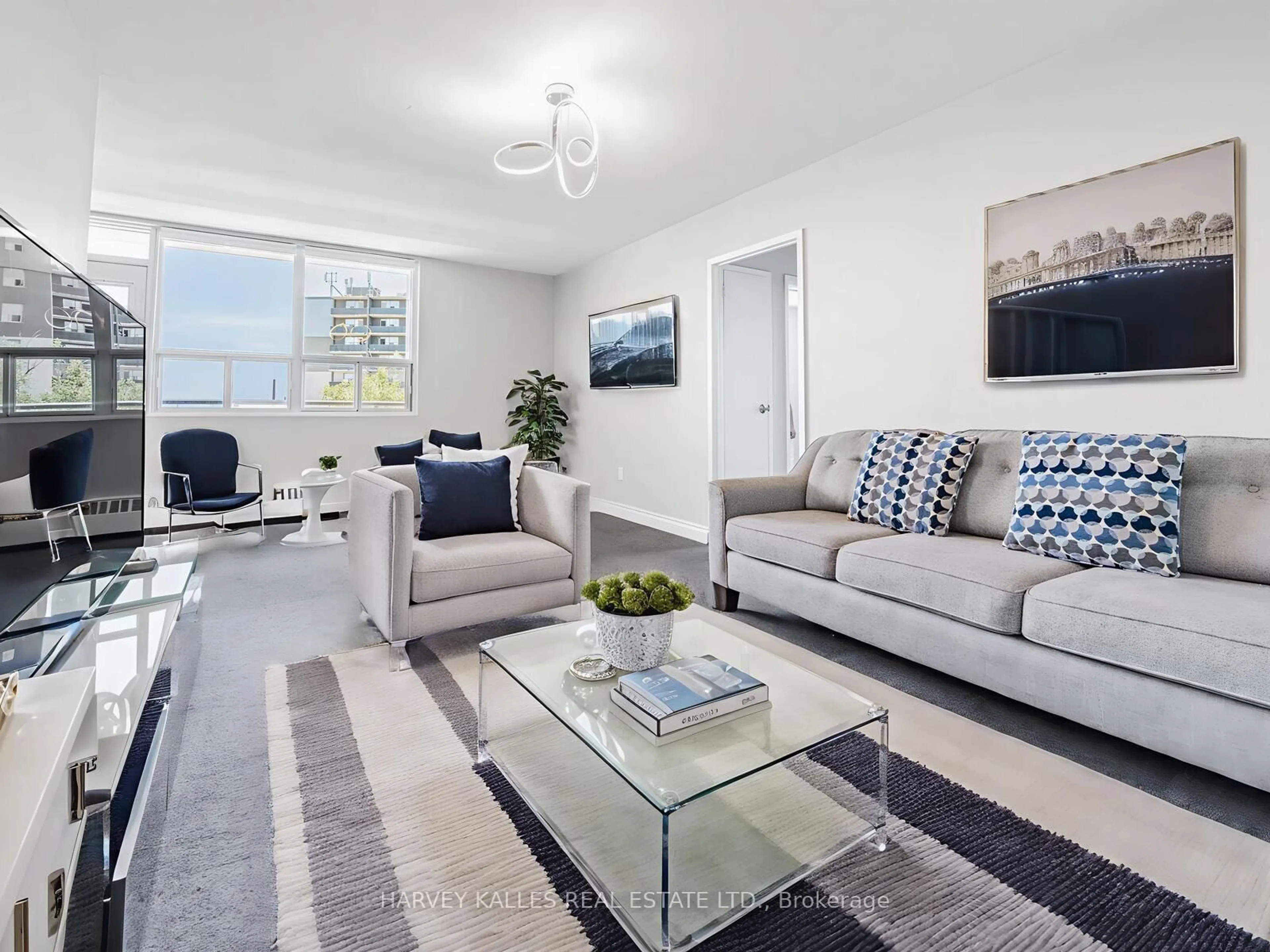 Living room with furniture, unknown for 3065 Queen Frederica Dr #505, Mississauga Ontario L4Y 3A3