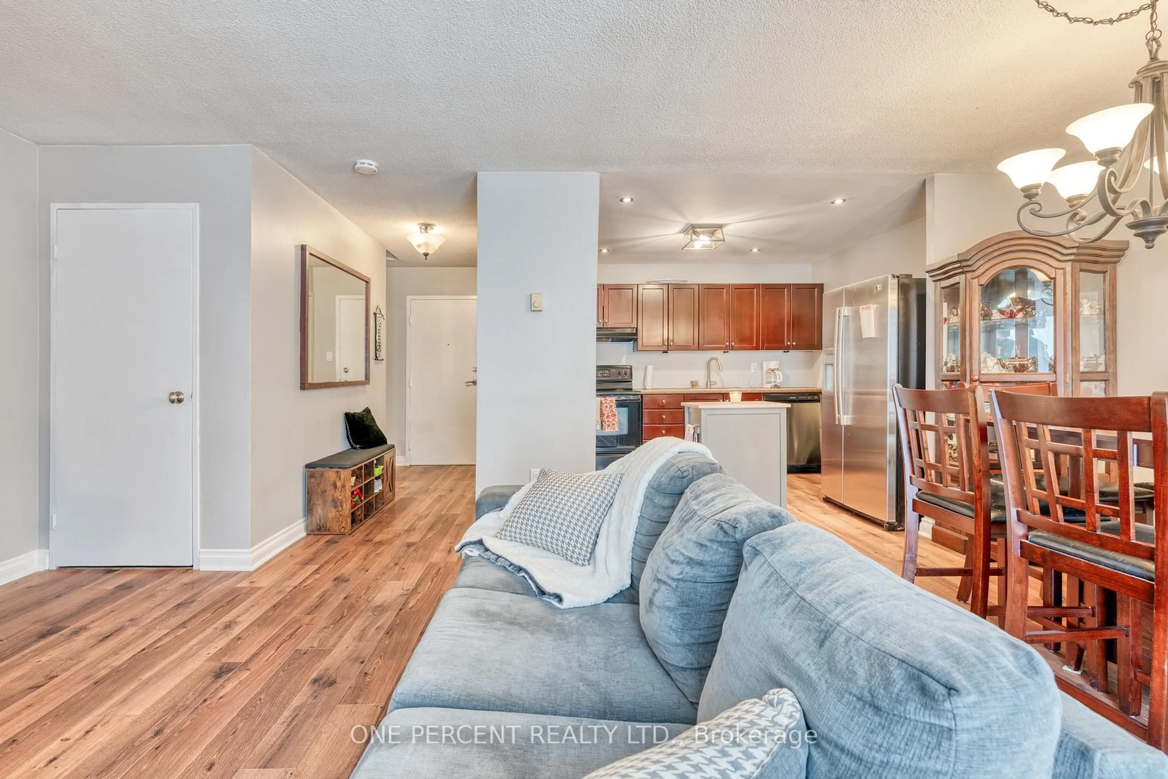 Living room with furniture, unknown for 1036 Falgarwood Dr #79, Oakville Ontario L6H 2P3