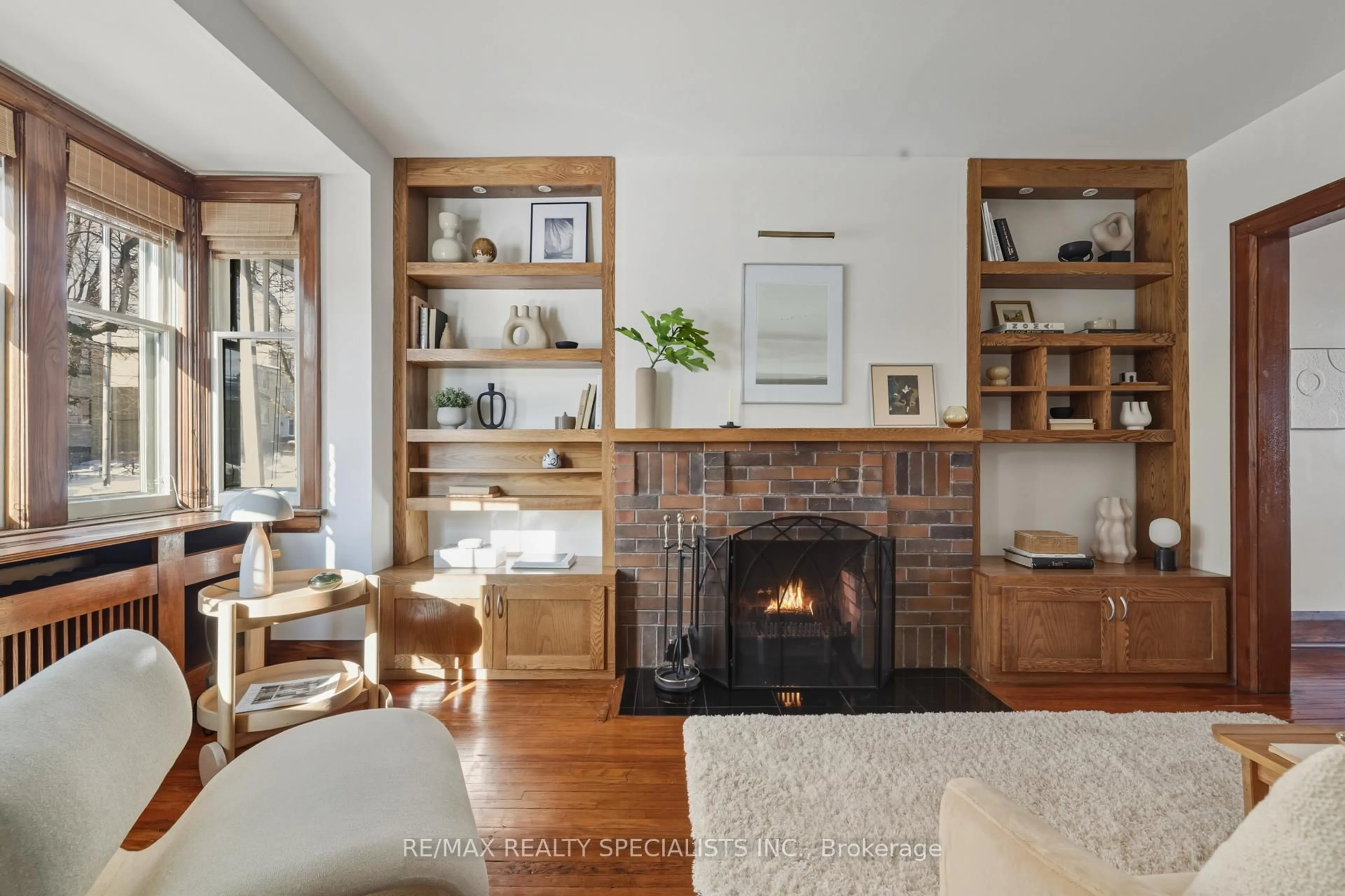 Living room with furniture, wood/laminate floor for 27 Albert Ave, Toronto Ontario M8V 2L6