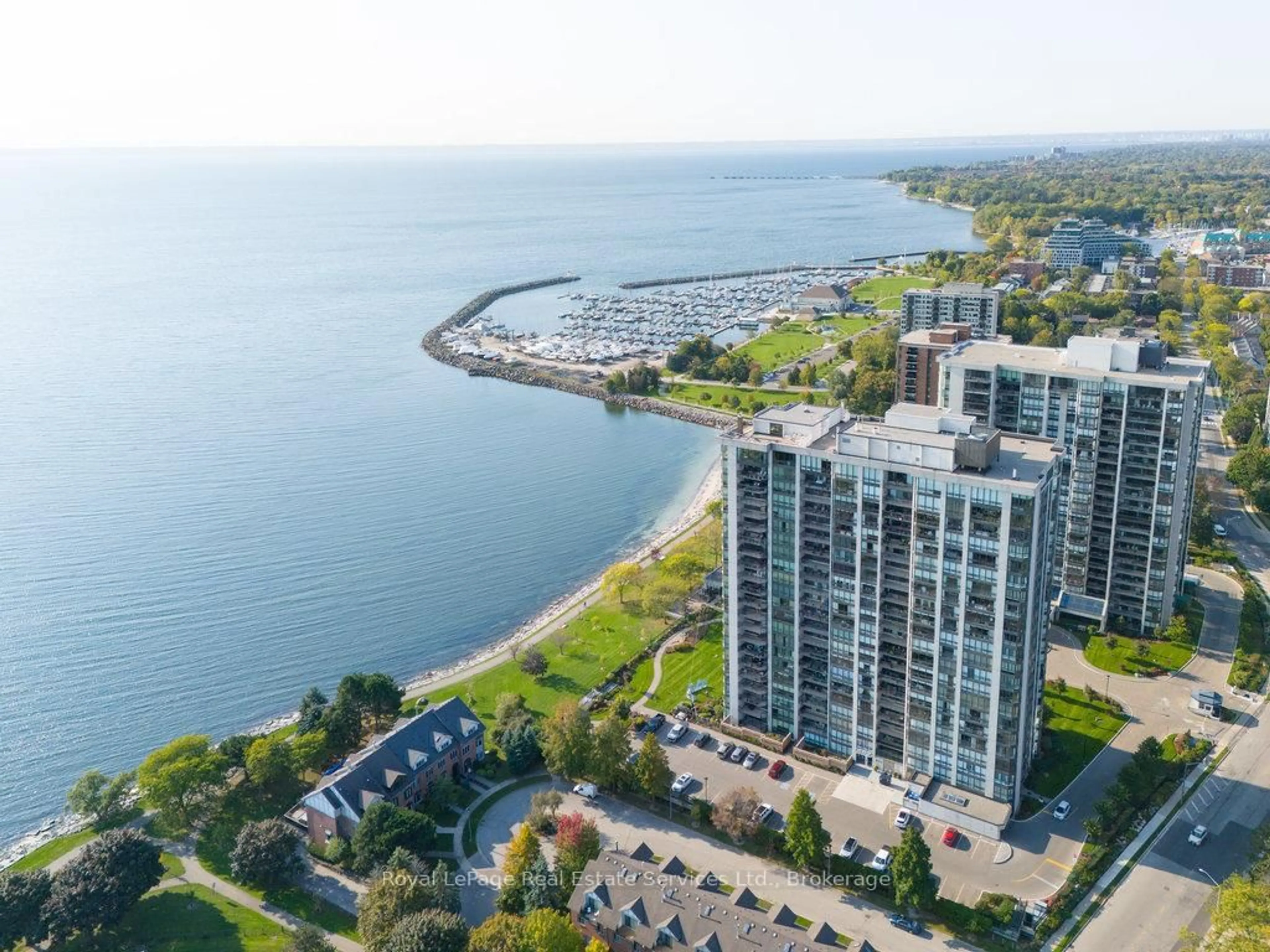 A pic from outside/outdoor area/front of a property/back of a property/a pic from drone, water/lake/river/ocean view for 2170 Marine Dr #701, Oakville Ontario L6L 5V1