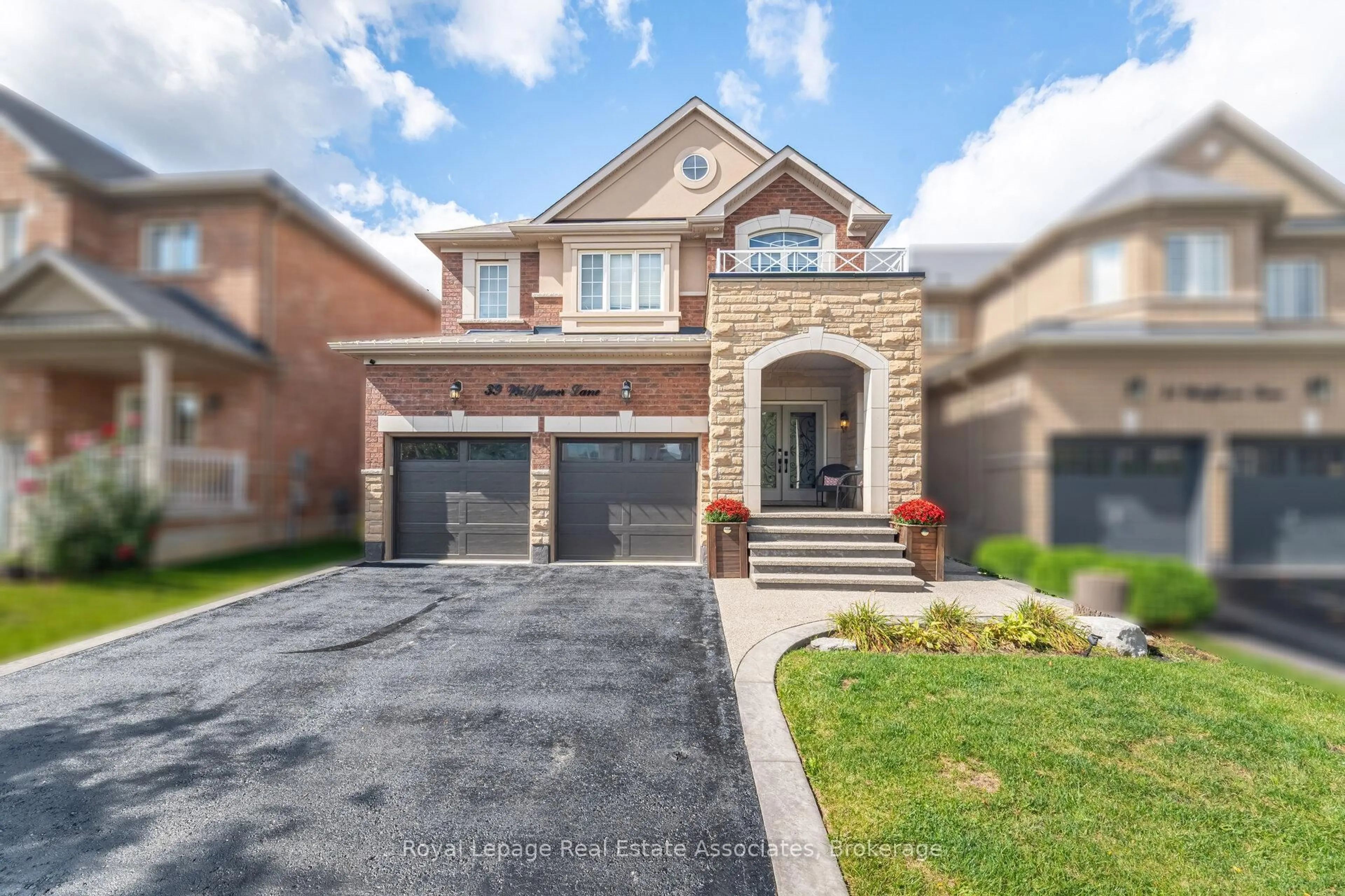 Home with brick exterior material, street for 39 Wildflower Lane, Halton Hills Ontario L7G 0H8