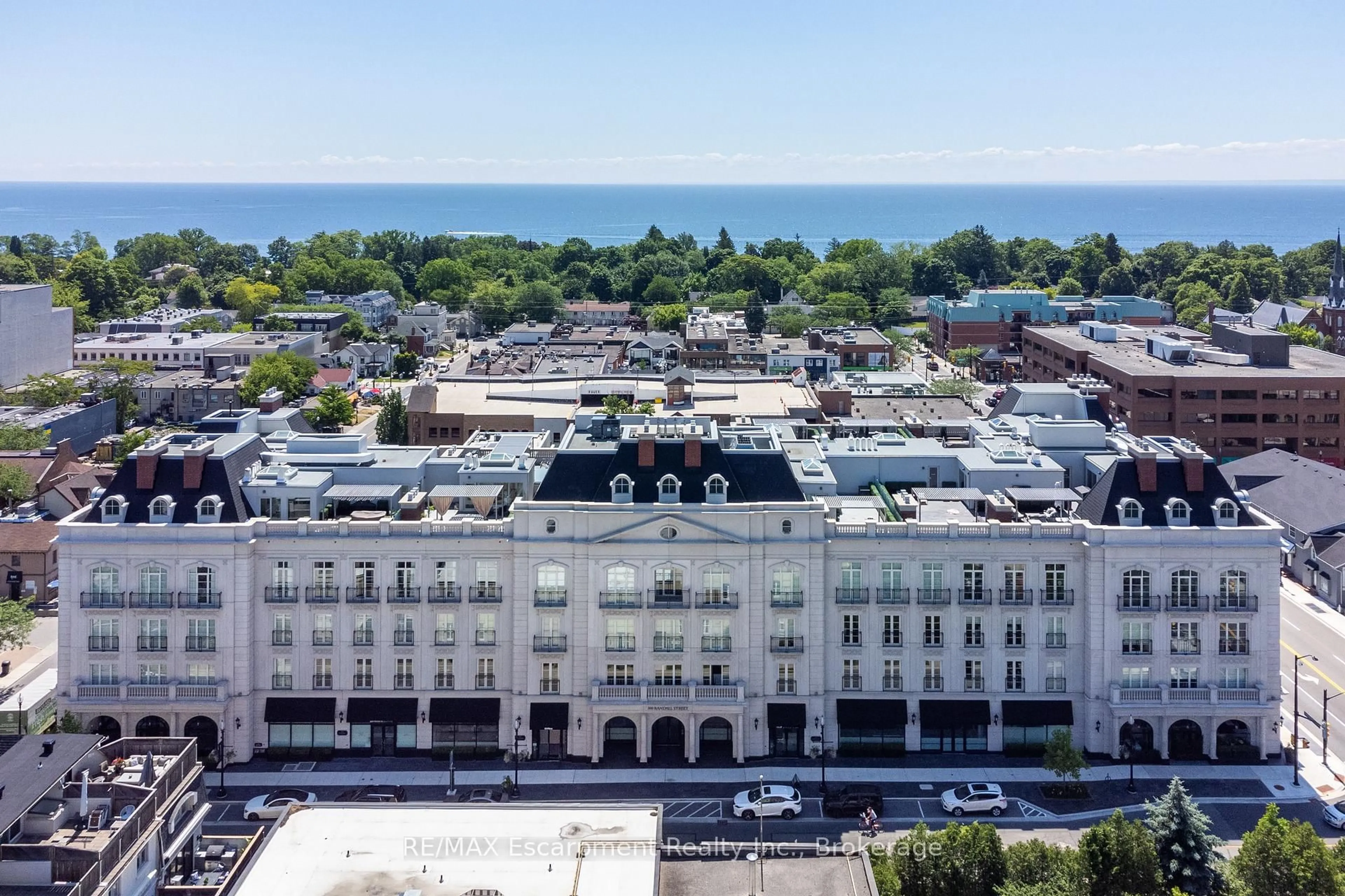 A pic from outside/outdoor area/front of a property/back of a property/a pic from drone, city buildings view from balcony for 300 Randall St #209, Oakville Ontario L6J 1R1