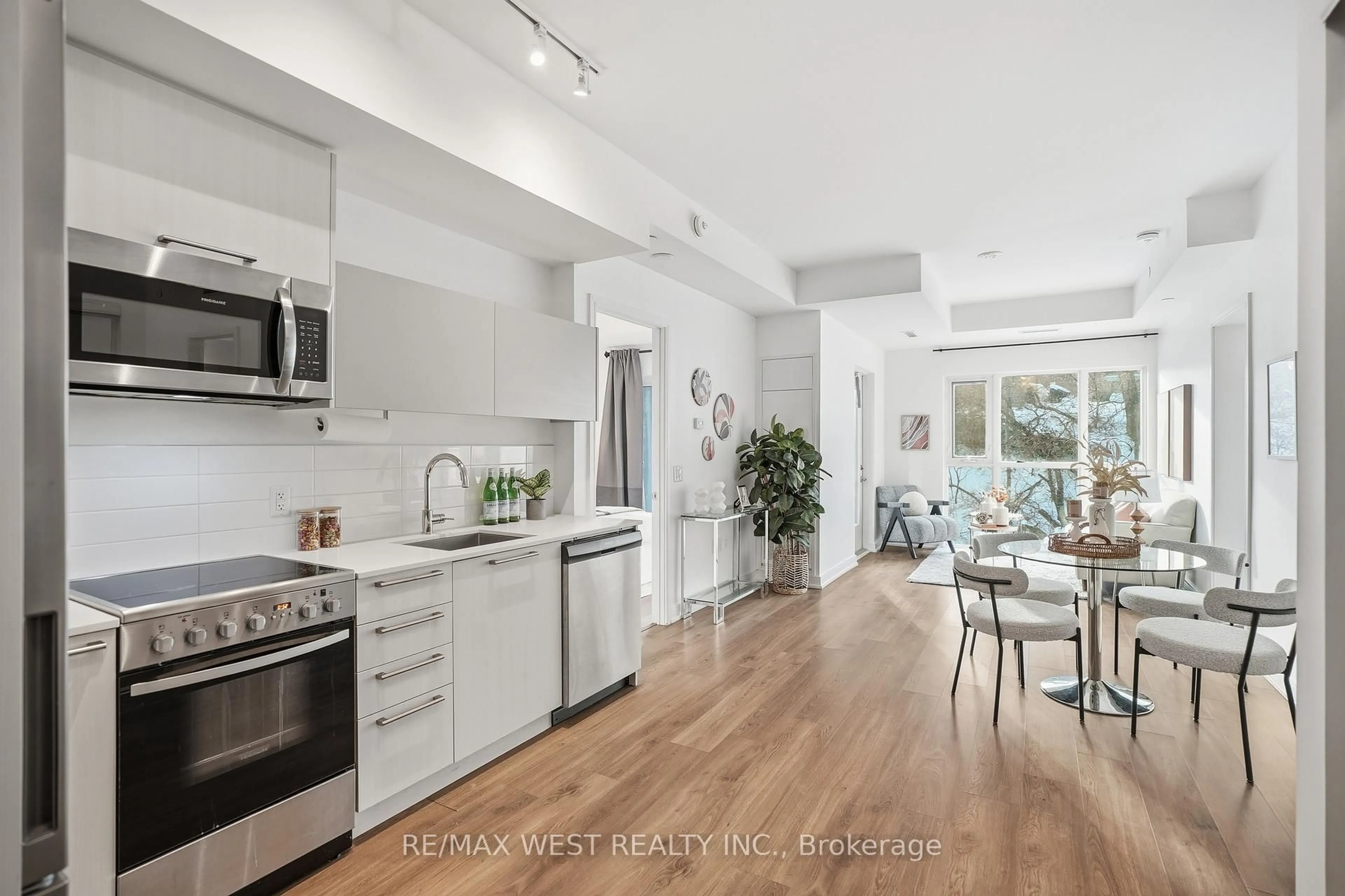 Open concept kitchen, unknown for 25 Neighbourhood Lane #306, Toronto Ontario M8Y 0C4