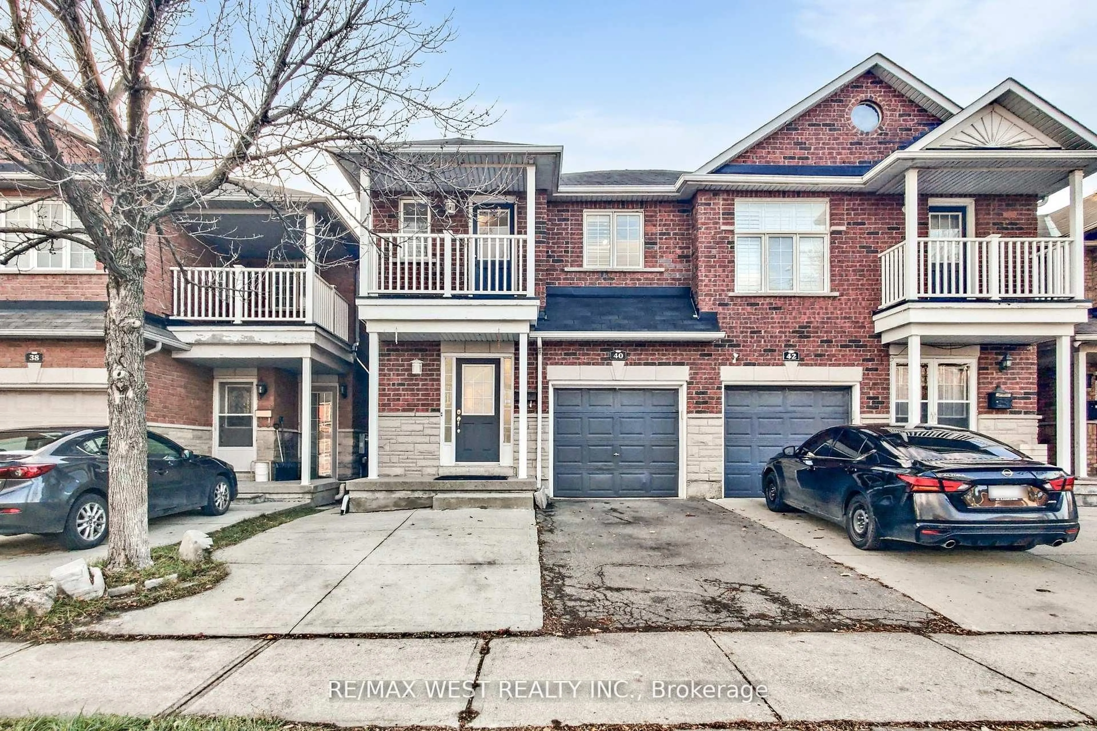 Home with brick exterior material, street for 40 San Gabriele Pl, Toronto Ontario M9L 3A4