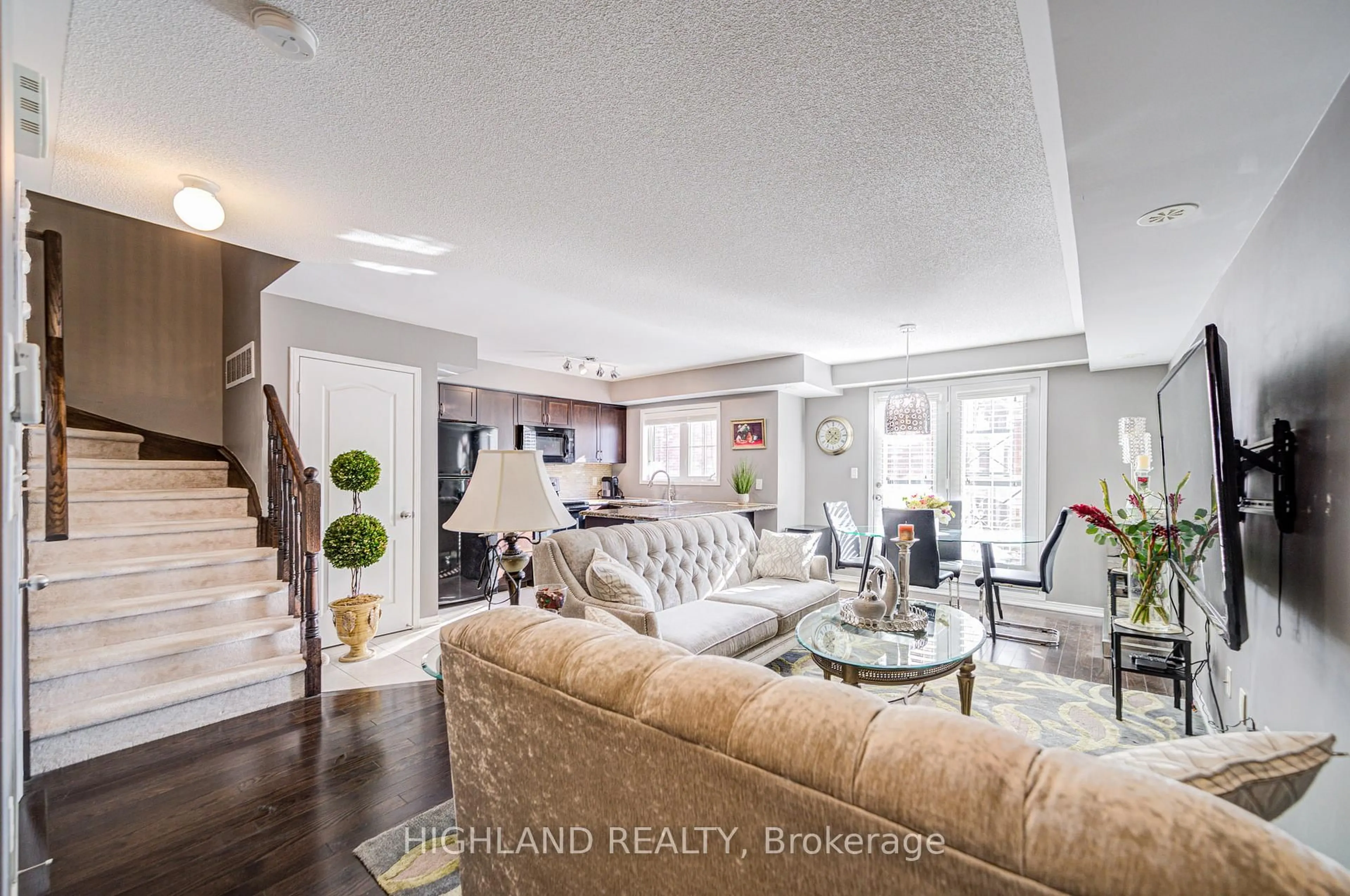 Living room with furniture, unknown for 2460 Post Rd #7, Oakville Ontario L6H 0J2