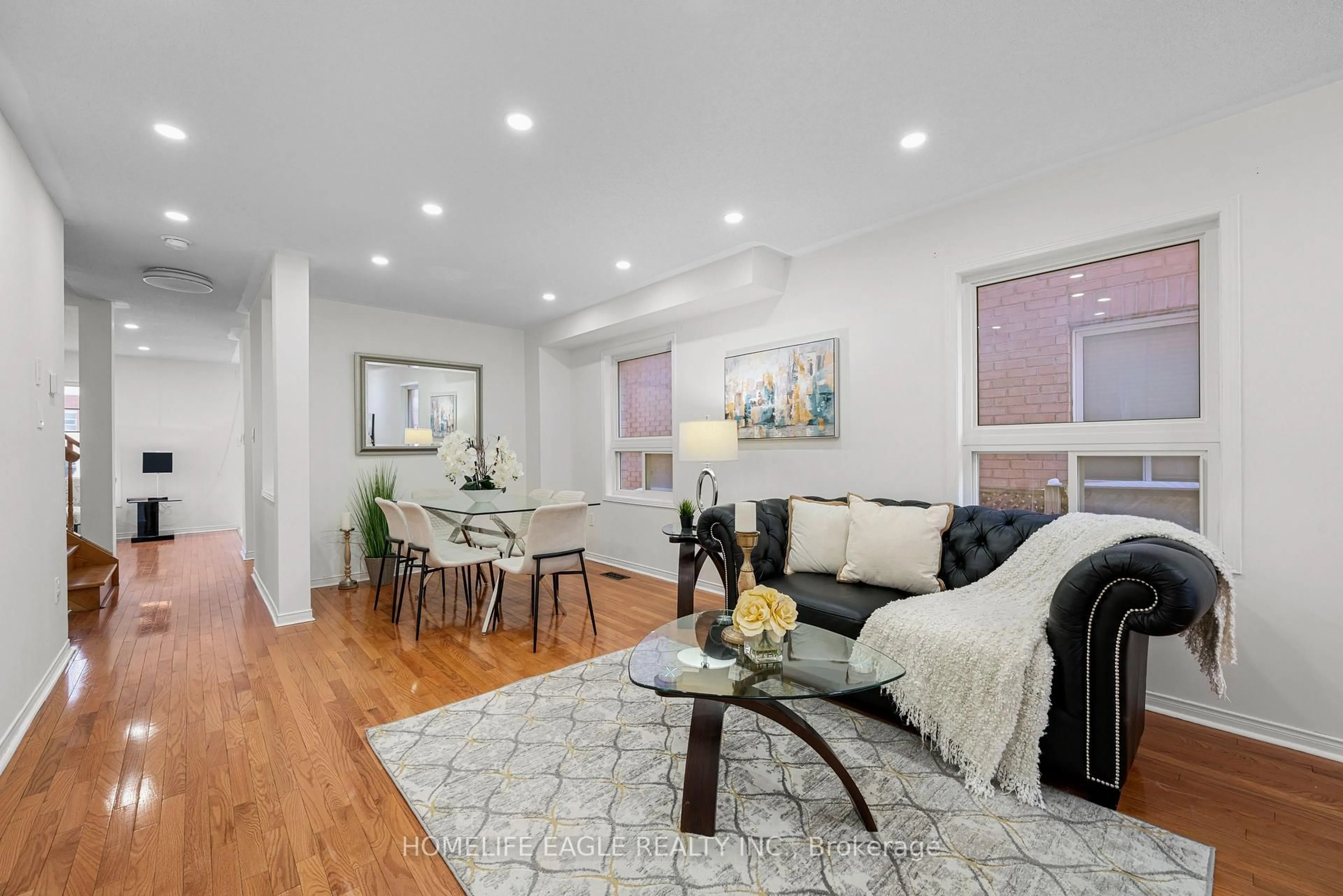 Living room with furniture, wood/laminate floor for 24 Ridgefield Crt, Brampton Ontario L6P 1B4