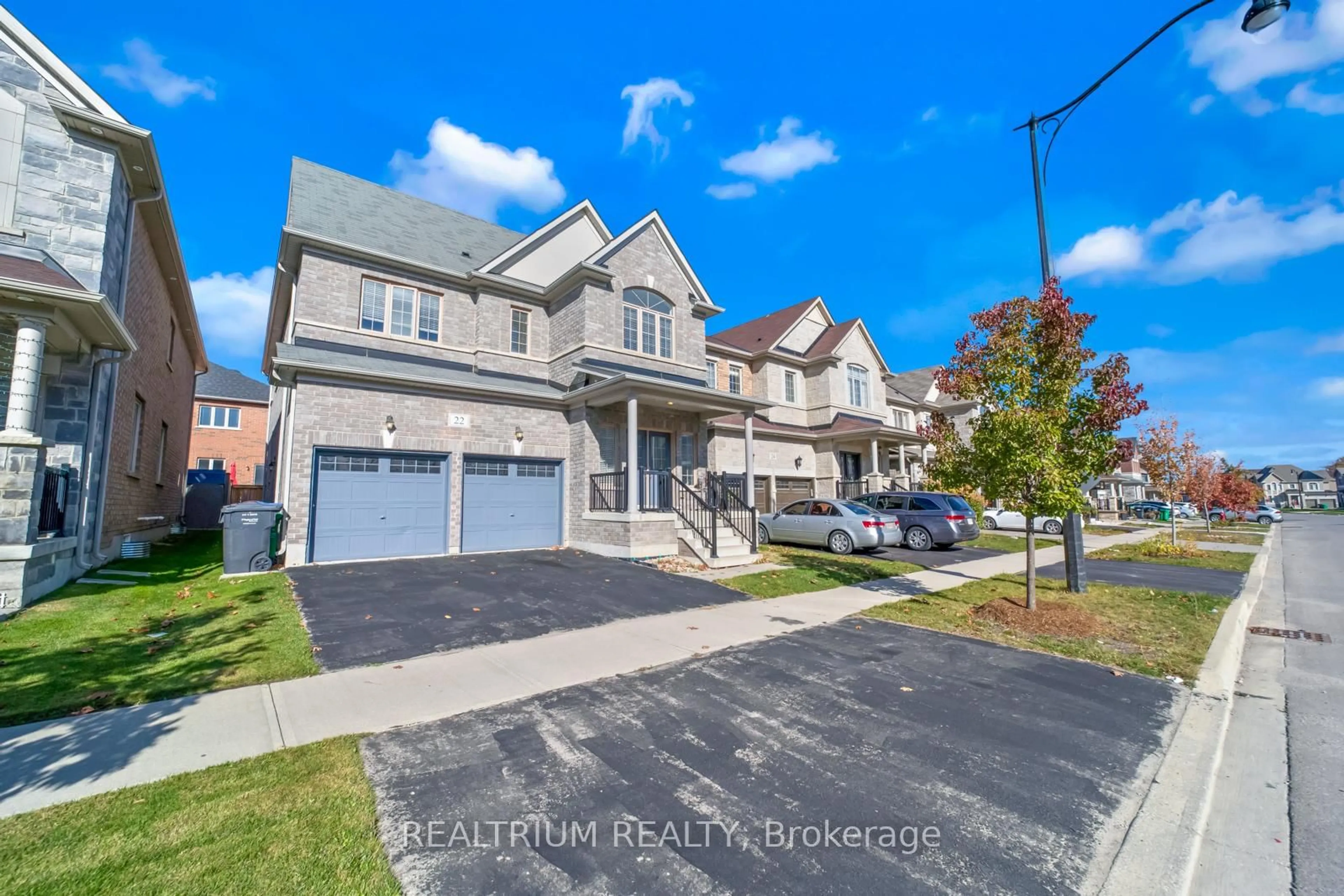 Home with brick exterior material, street for 22 Clockwork Dr, Brampton Ontario L7A 4R8