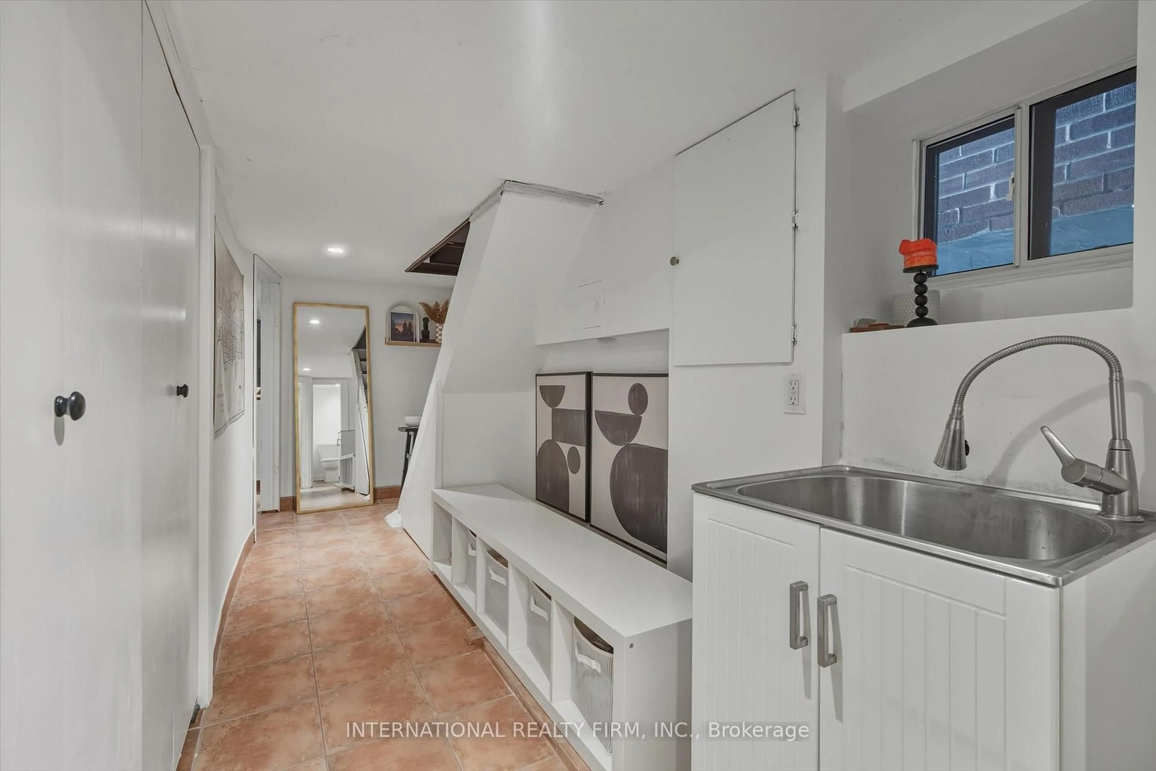 Kitchen with laundary machines, ceramic/tile floor for 47 Via Italia, Toronto Ontario M6H 3R4