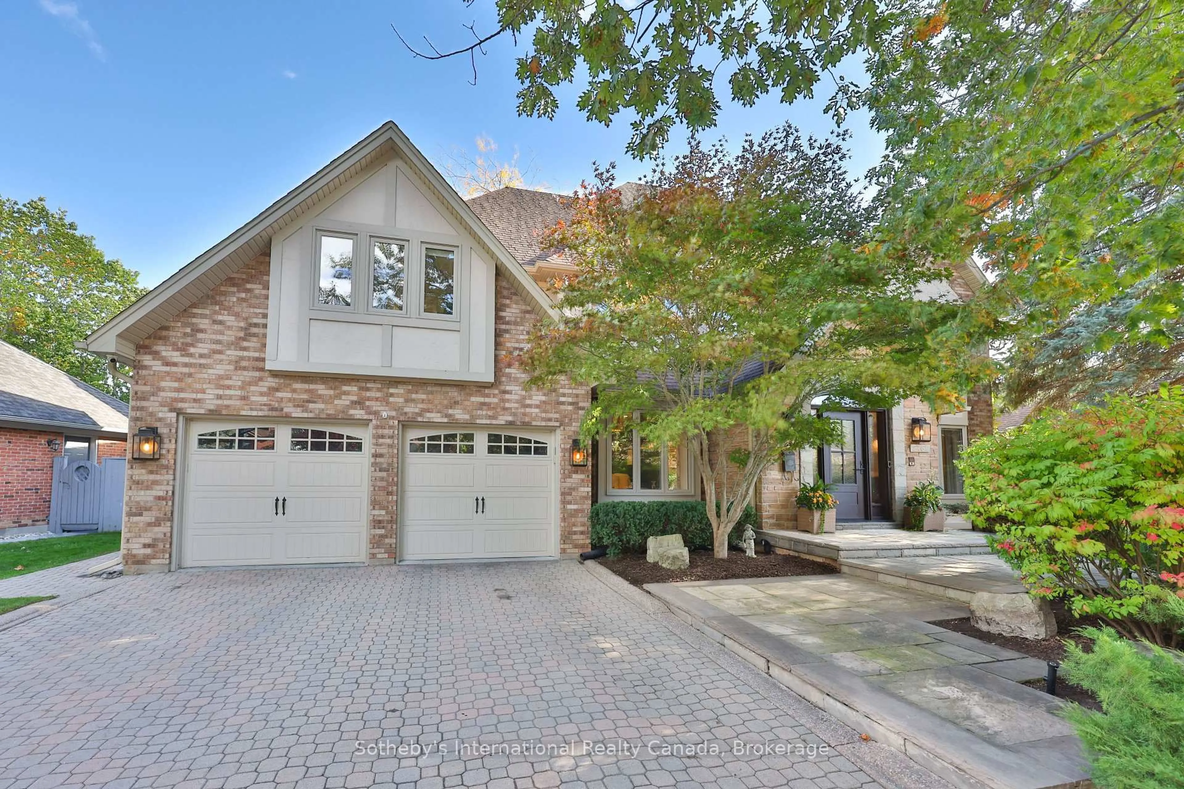 Home with brick exterior material, street for 2464 Deer Run Ave, Oakville Ontario L6J 6K9