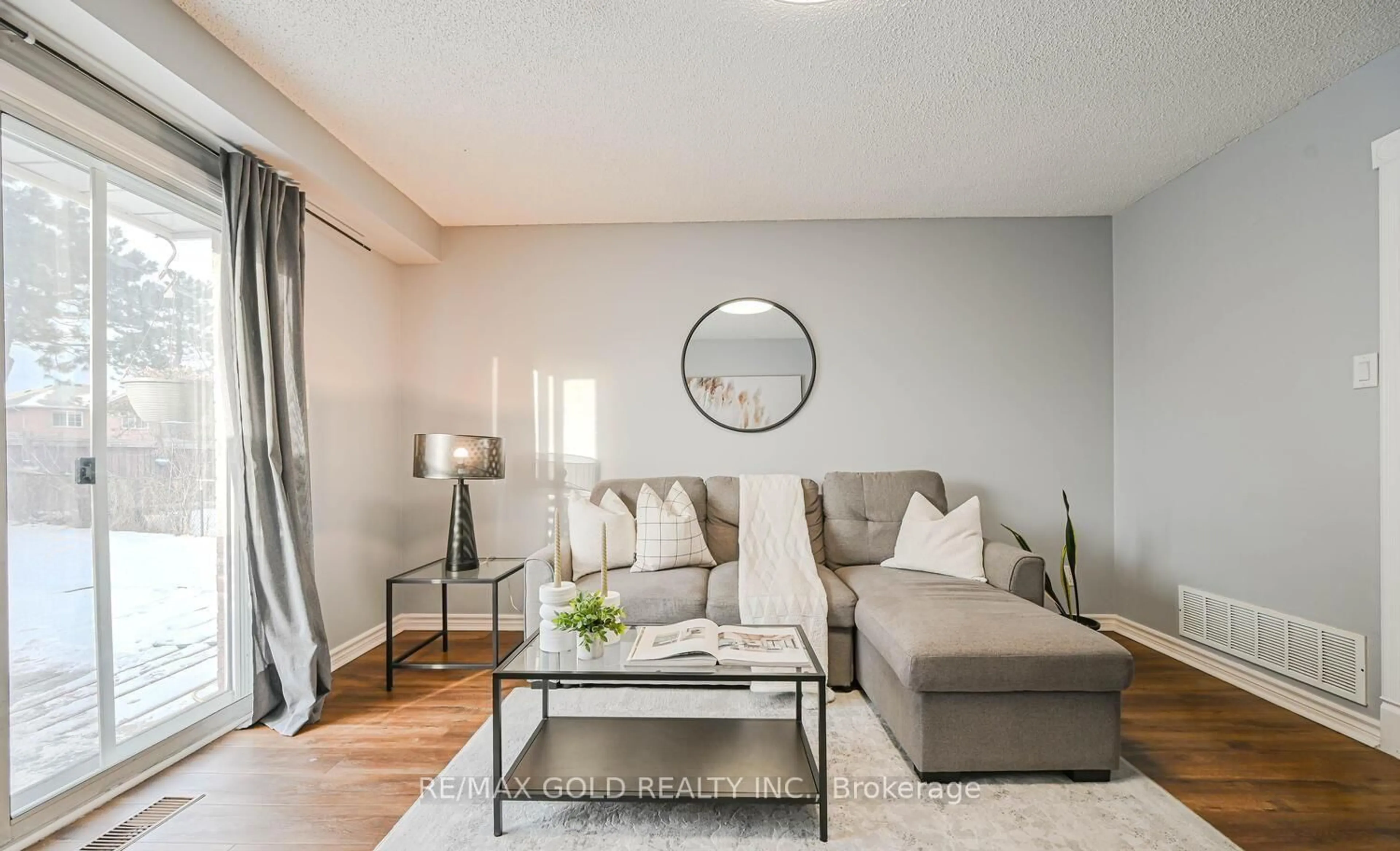 Living room with furniture, unknown for 73 Chipmunk Cres, Brampton Ontario L6R 1B4