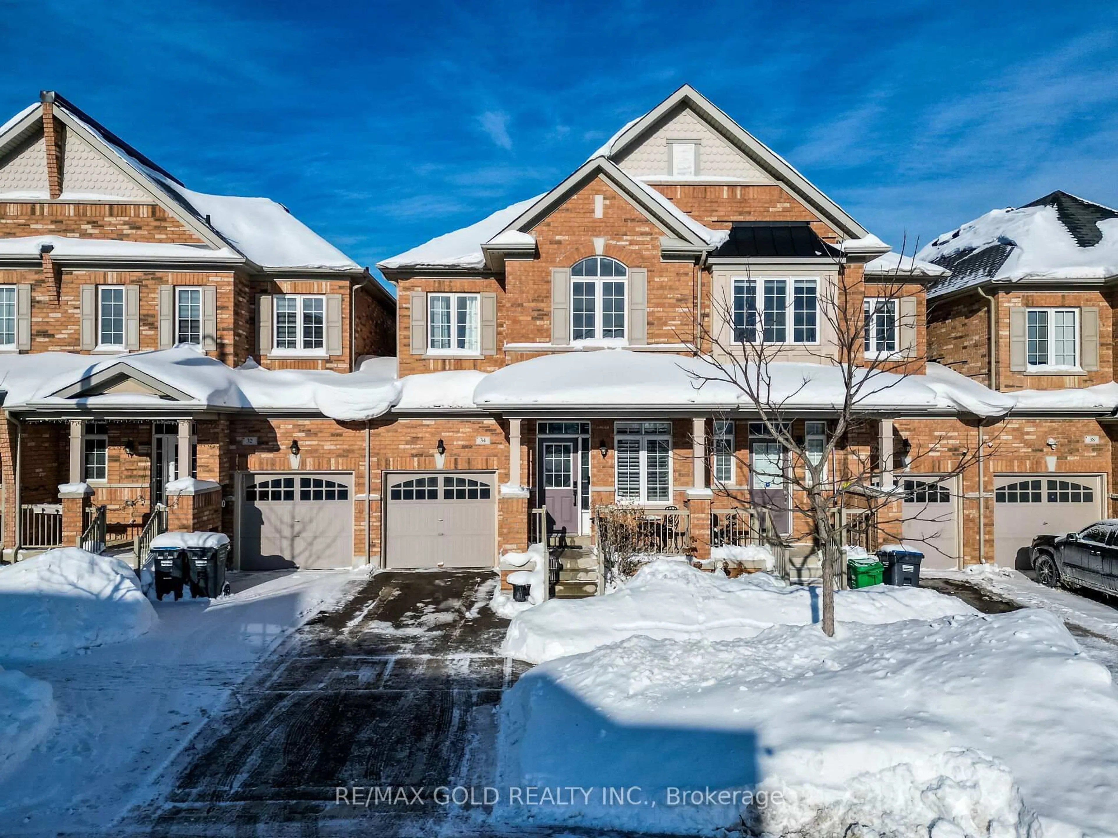 Home with brick exterior material, street for 34 Kempenfelt Tr, Brampton Ontario L7A 0Z6