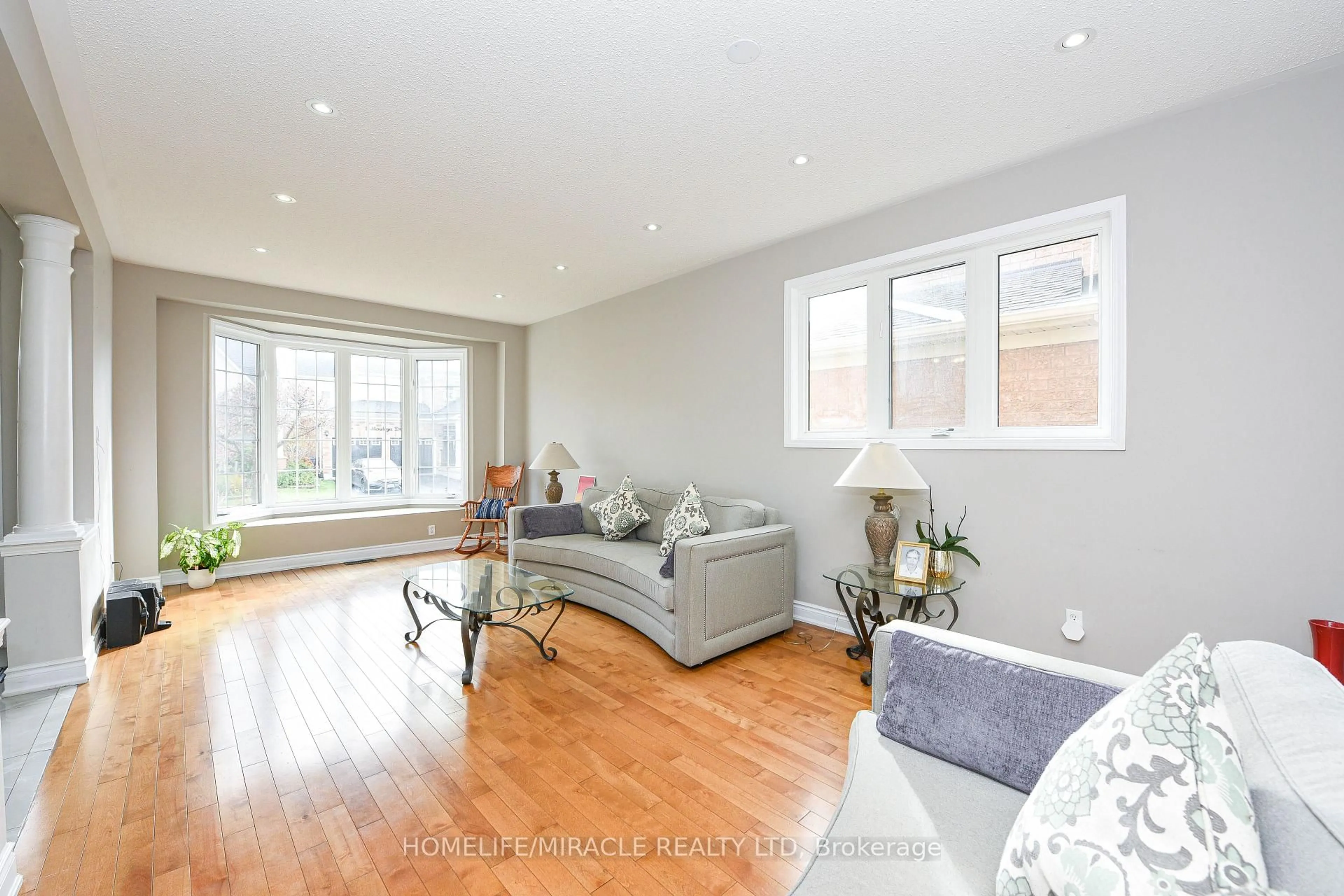 Living room with furniture, wood/laminate floor for 6 Mendoza Dr, Brampton Ontario L7A 3M3