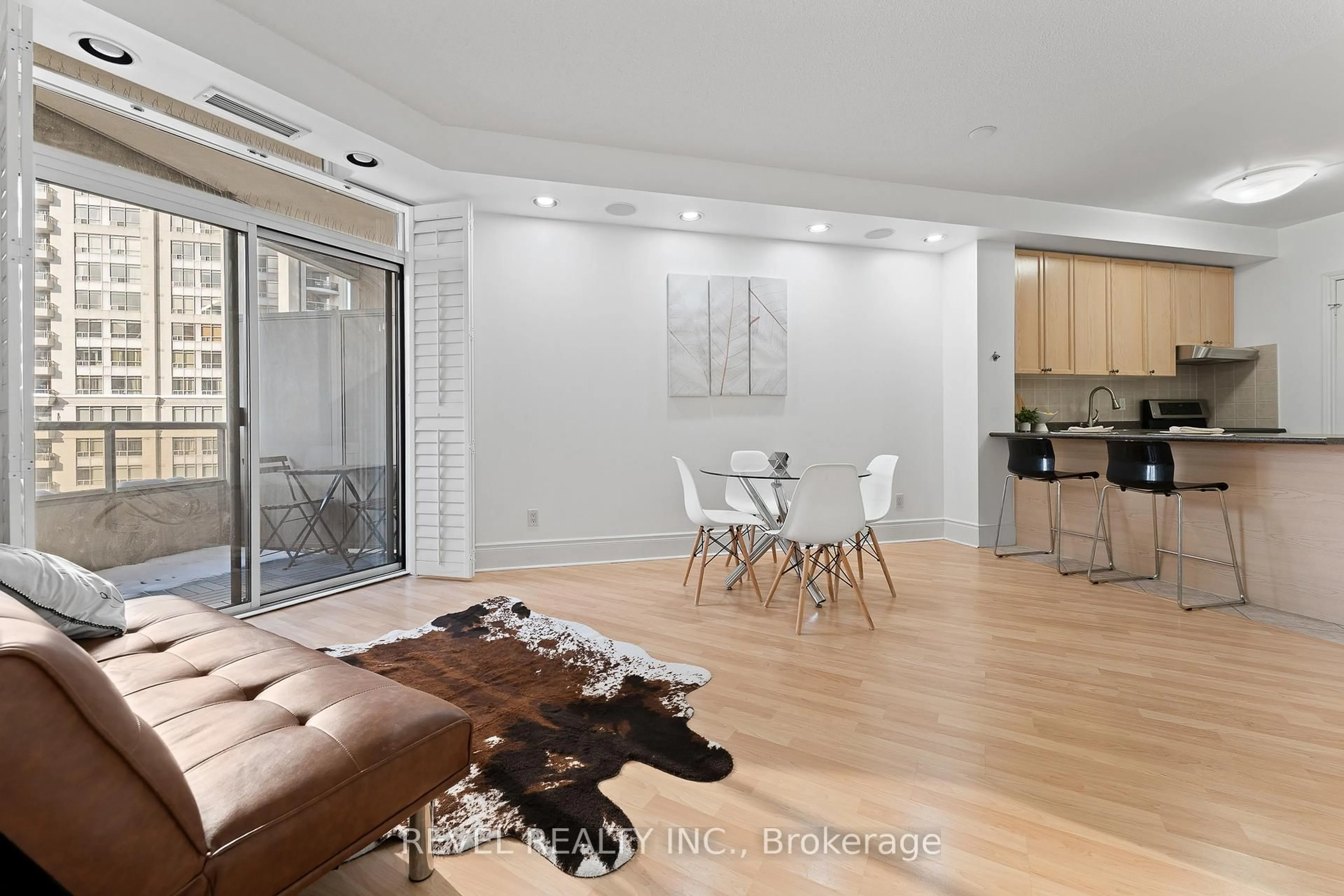 Living room with furniture, wood/laminate floor for 3880 Duke Of York Blvd #1101, Mississauga Ontario L5B 4M7