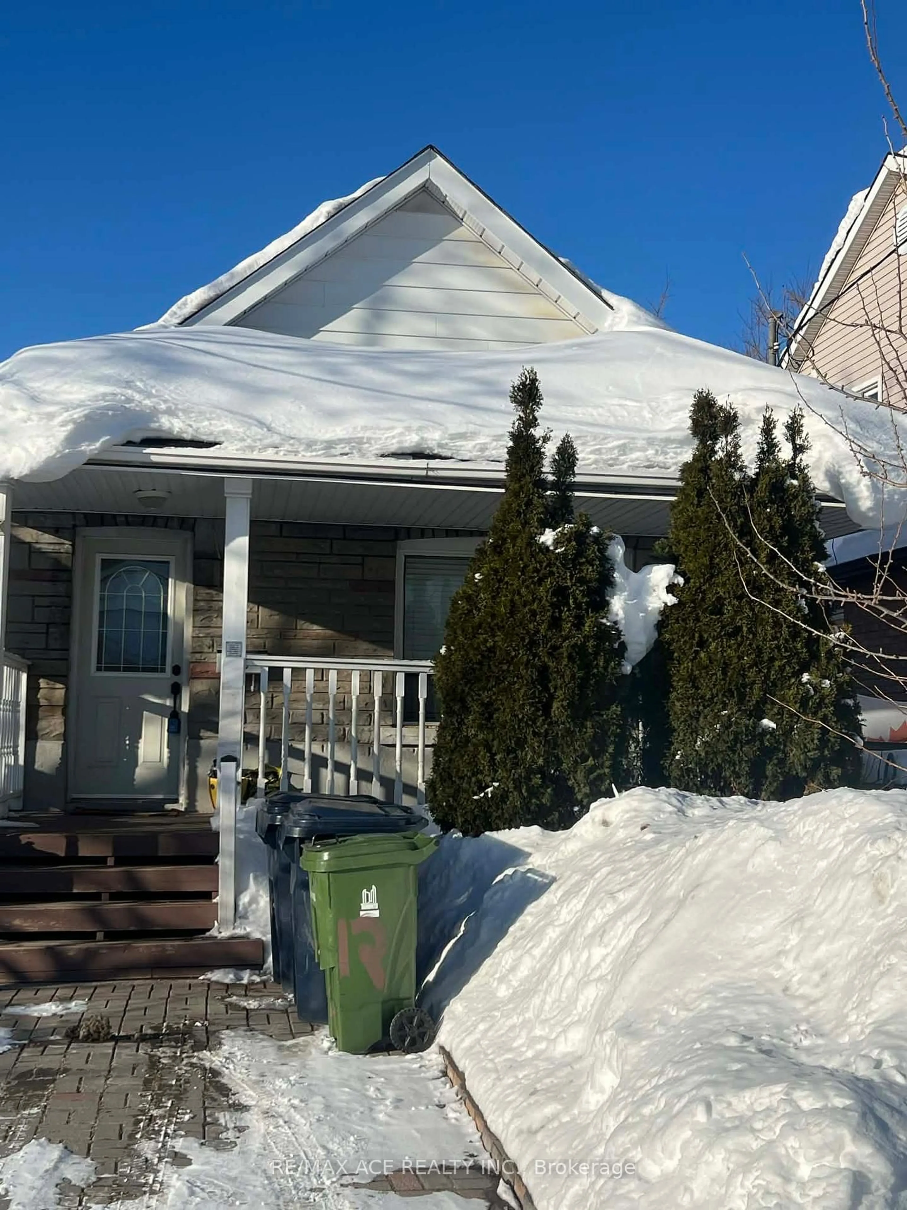 Home with vinyl exterior material, street for 12 Mahoney Ave, Toronto Ontario M6M 2H4