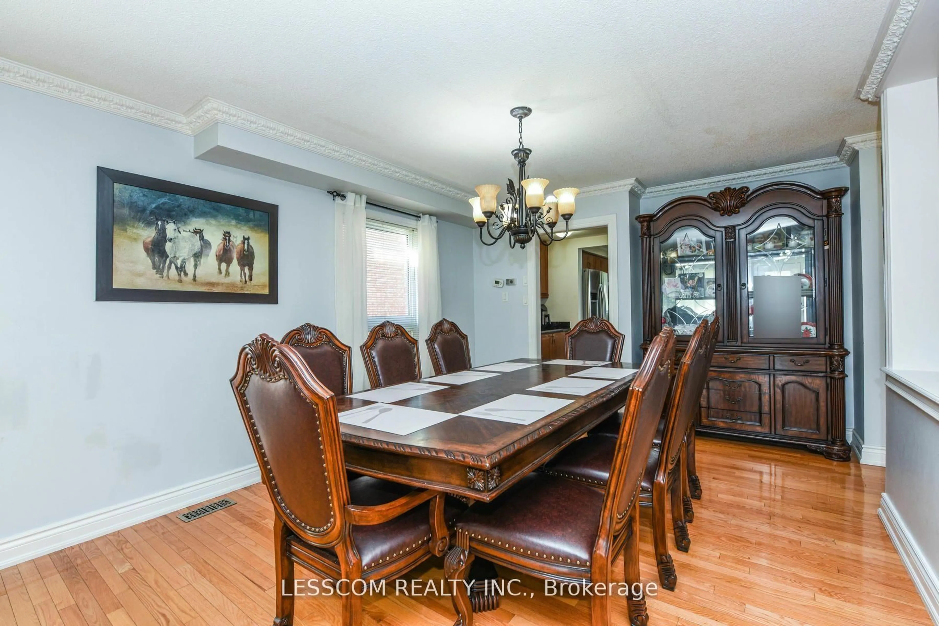 Dining room, wood/laminate floor for 30 Fairhill Ave, Brampton Ontario L7A 2E7