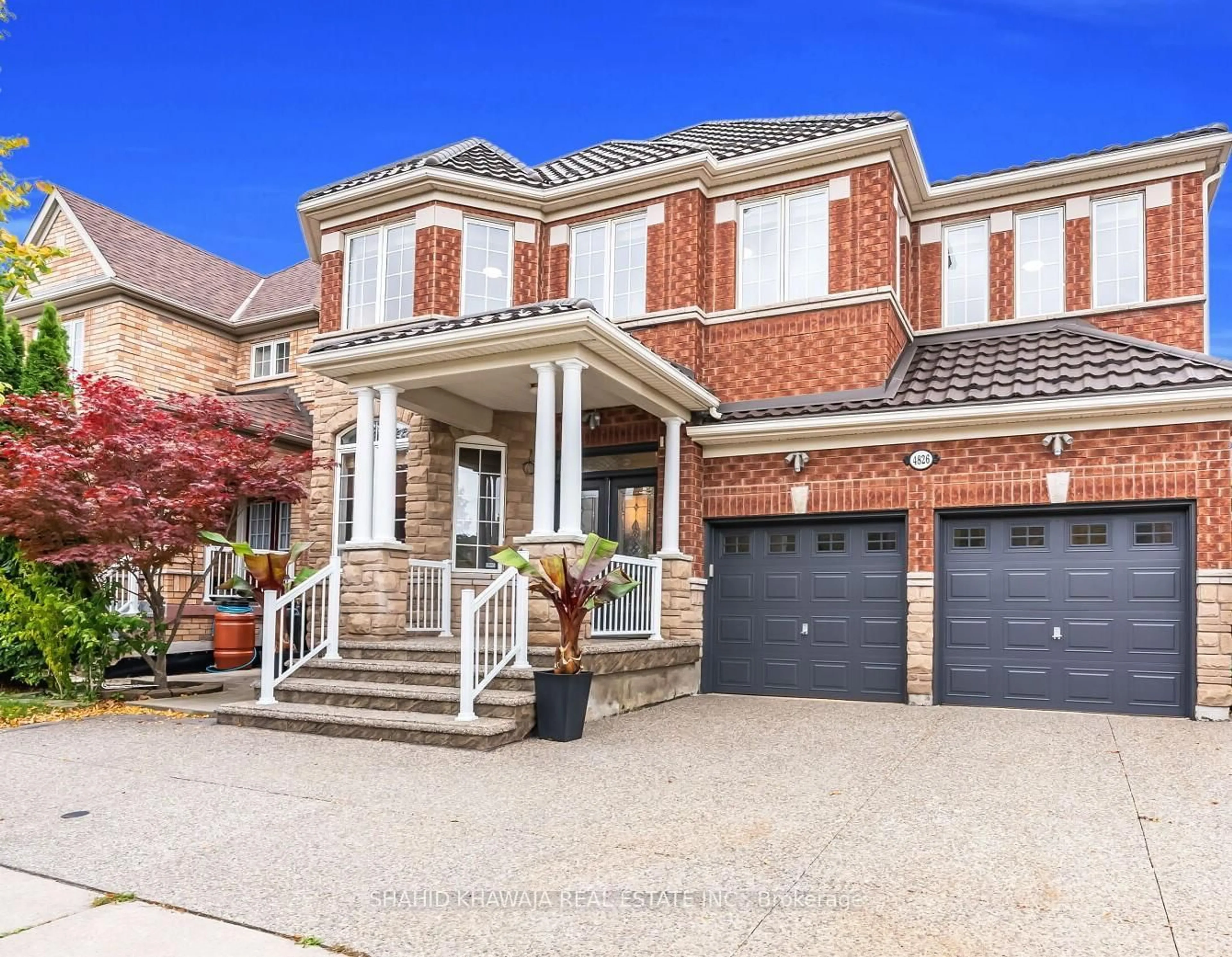 Home with brick exterior material, street for 4826 St. Martin Mews, Mississauga Ontario L5M 7J9
