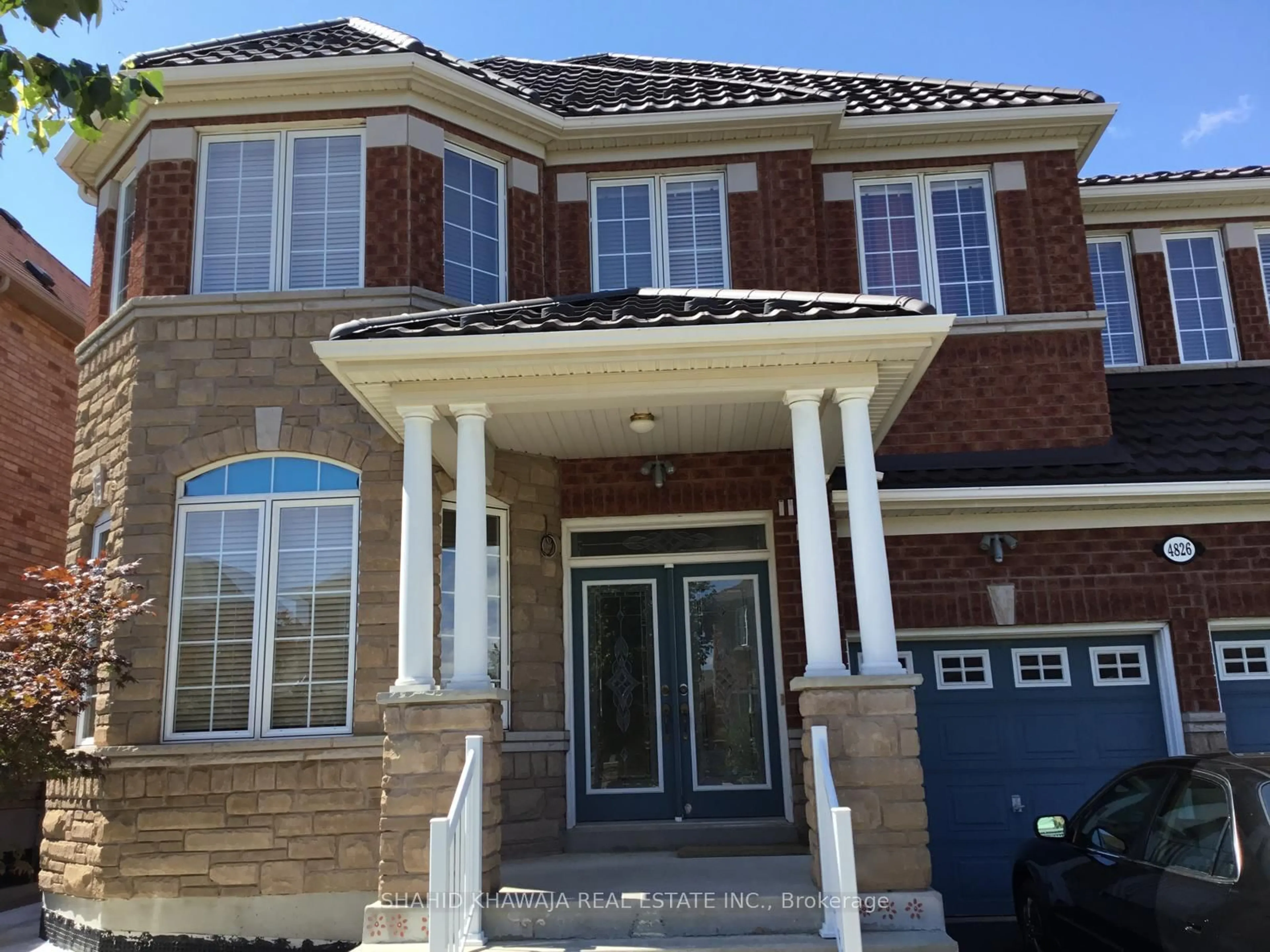 Home with brick exterior material, street for 4826 St. Martin Mews, Mississauga Ontario L5M 7J9