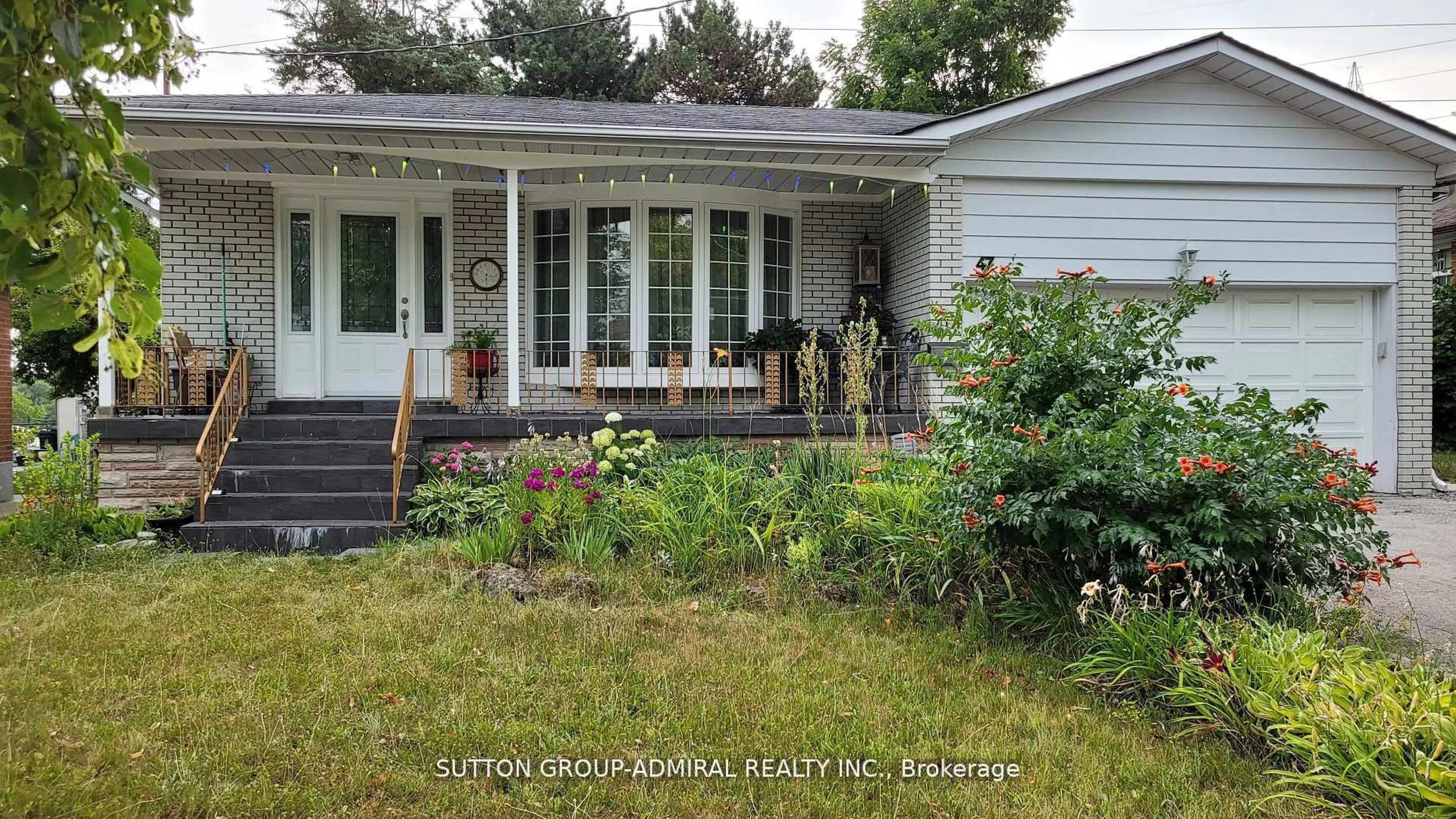 Home with vinyl exterior material, street for 47 Tobermory Dr, Toronto Ontario M3N 2R4