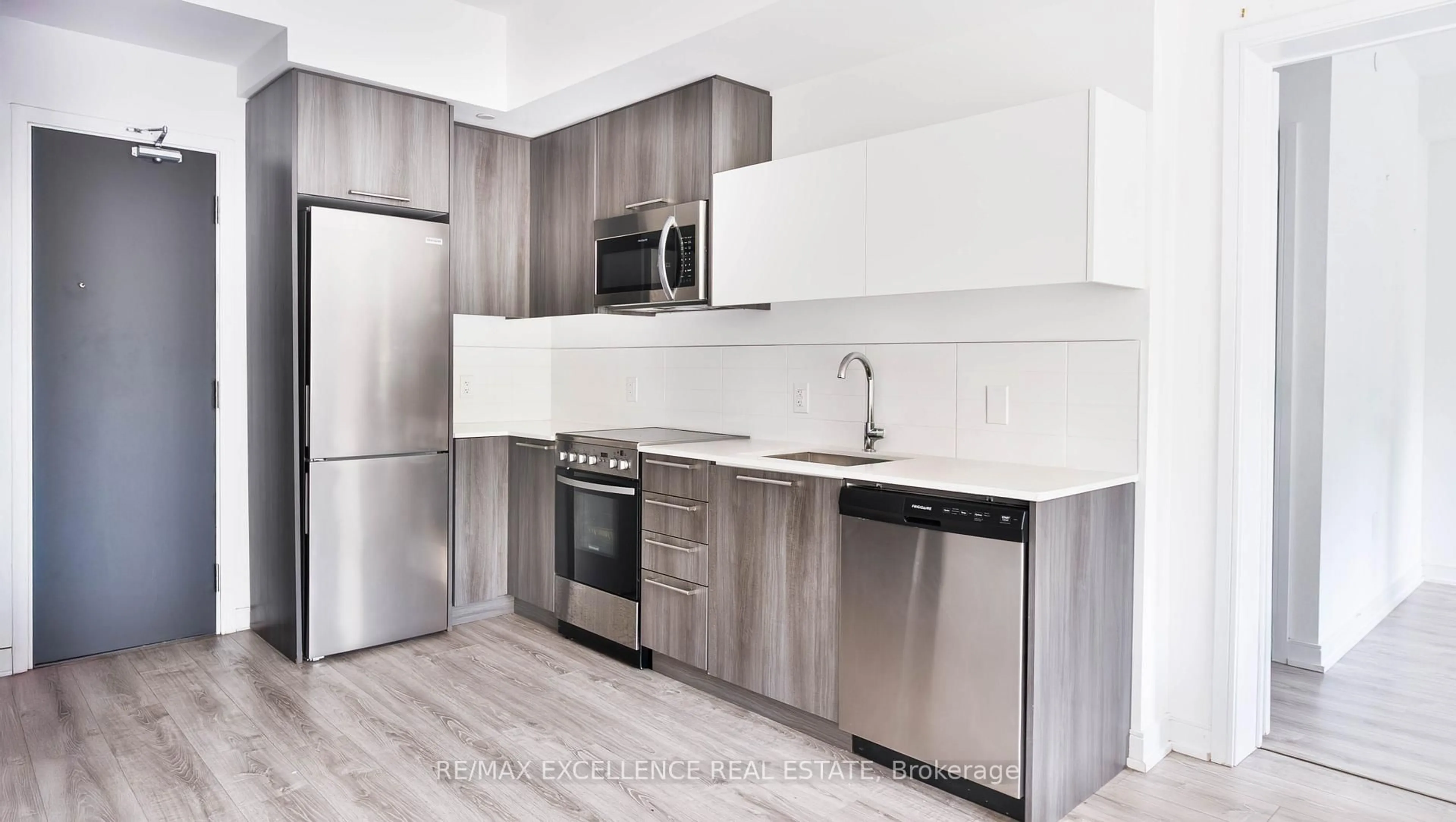 Standard kitchen, wood/laminate floor for 25 Neighbourhood Lane #507, Toronto Ontario M8Y 0C4