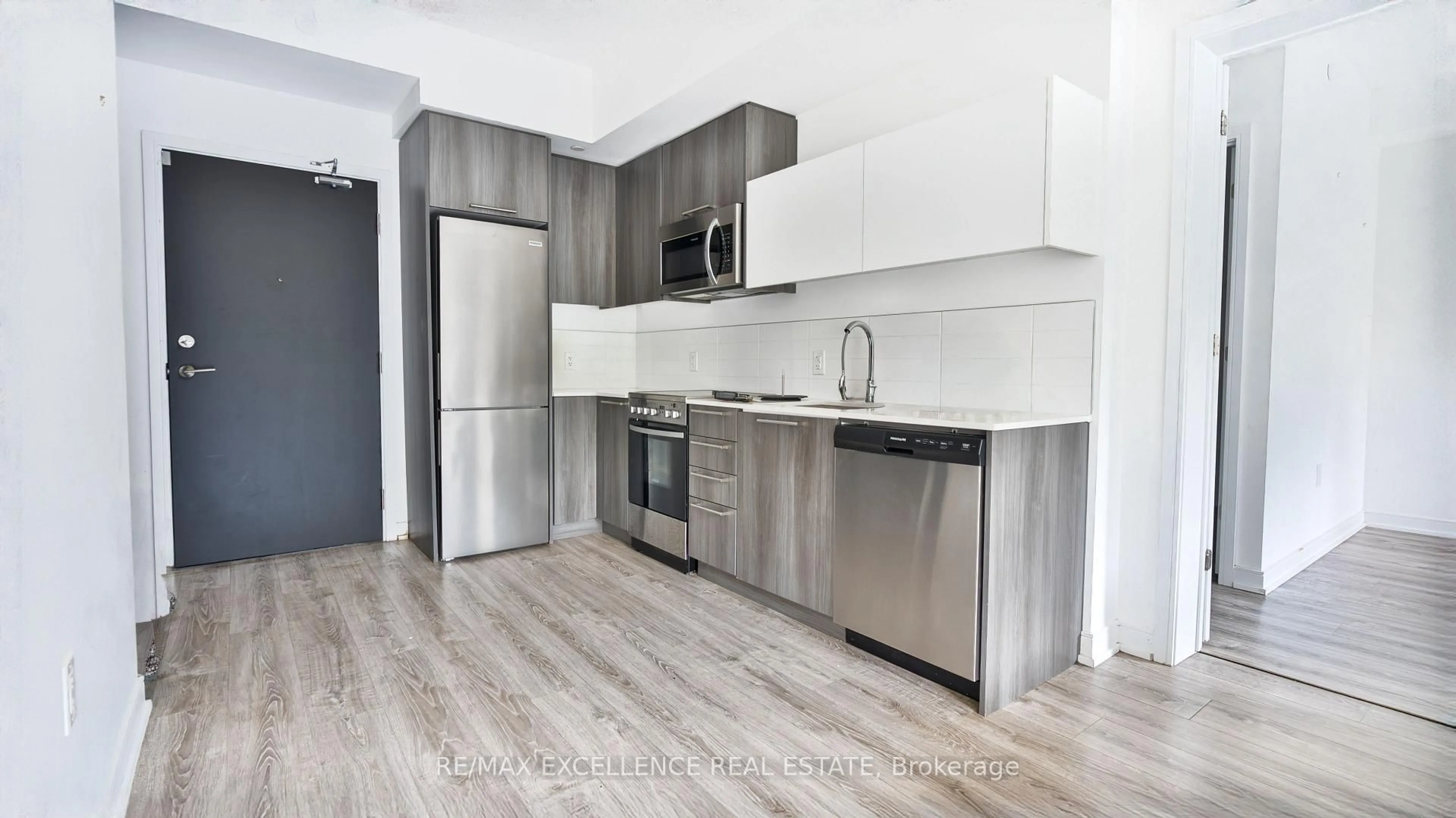 Standard kitchen, wood/laminate floor for 25 Neighbourhood Lane #507, Toronto Ontario M8Y 0C4