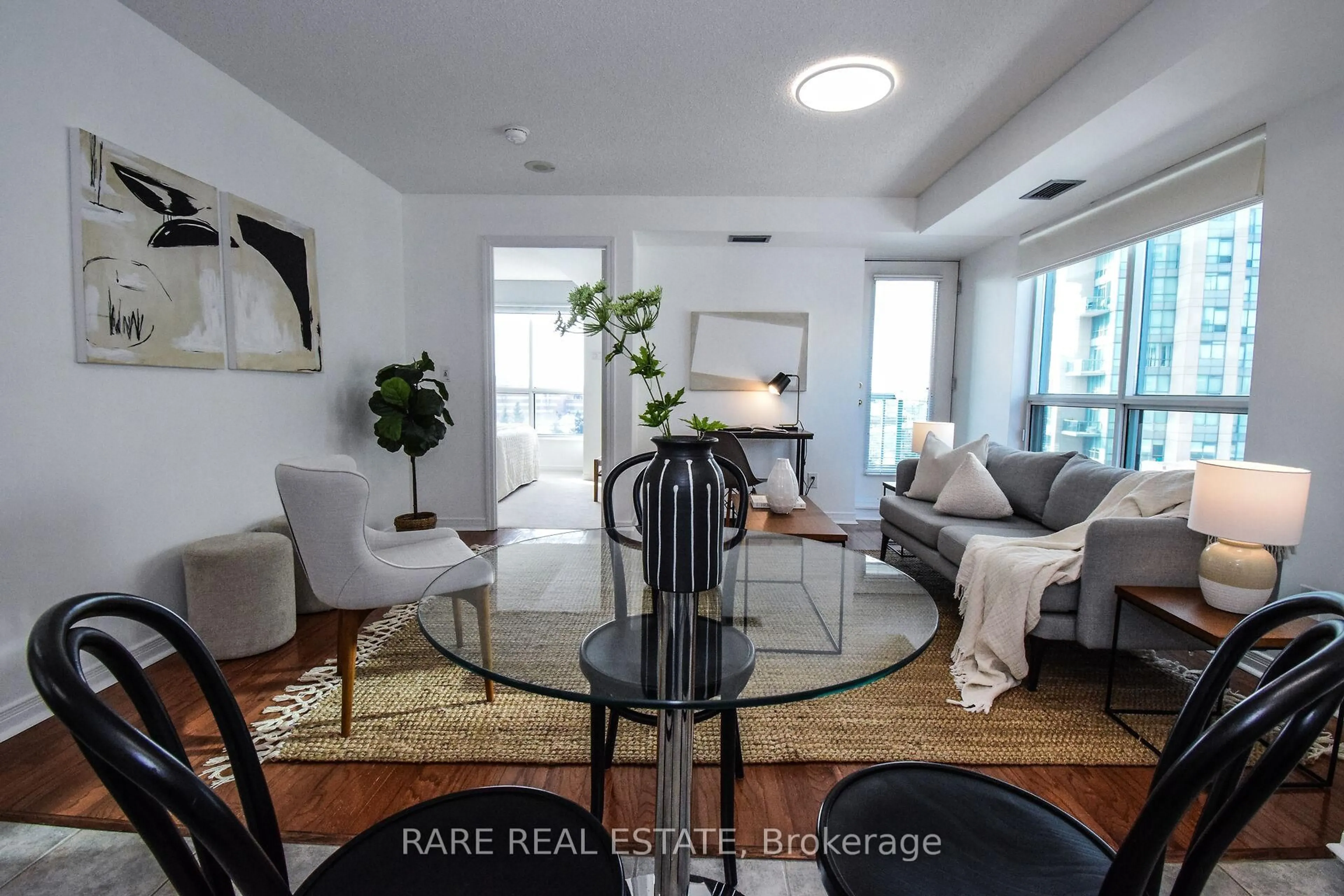 Living room with furniture, unknown for 2545 Erin Centre Blvd #509, Mississauga Ontario L5N 6Z9