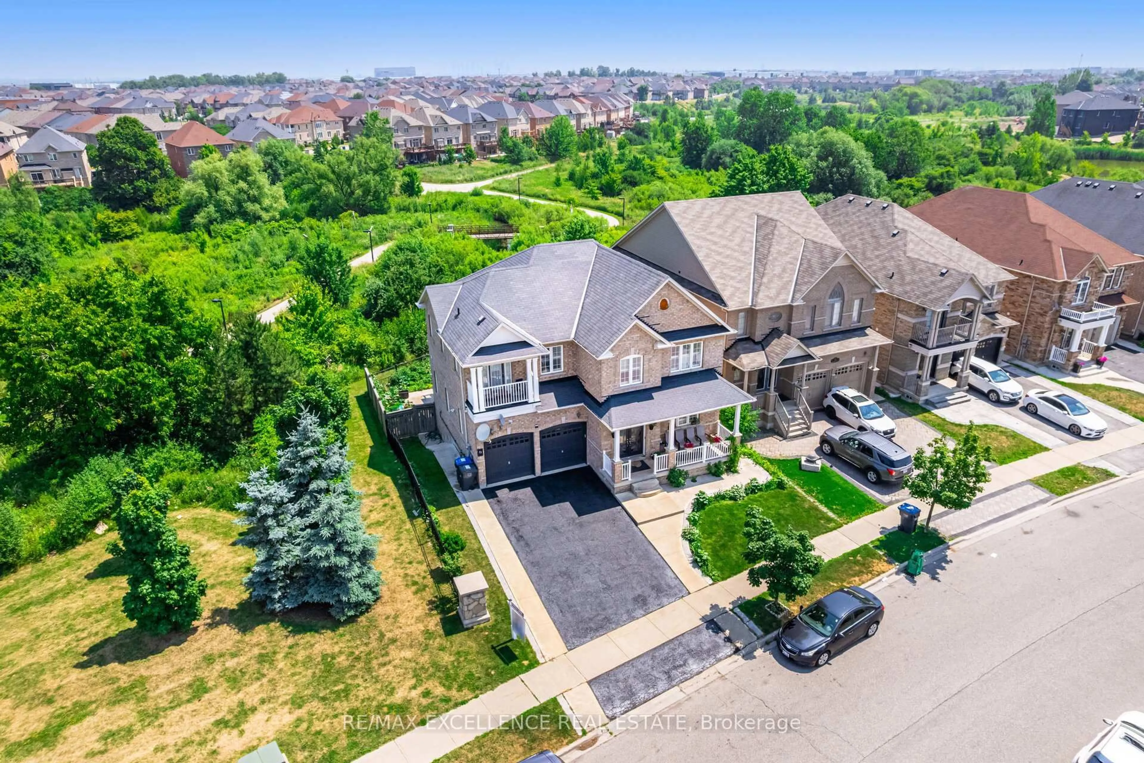 A pic from outside/outdoor area/front of a property/back of a property/a pic from drone, street for 73 Gardenbrooke Tr, Brampton Ontario L6P 3J3
