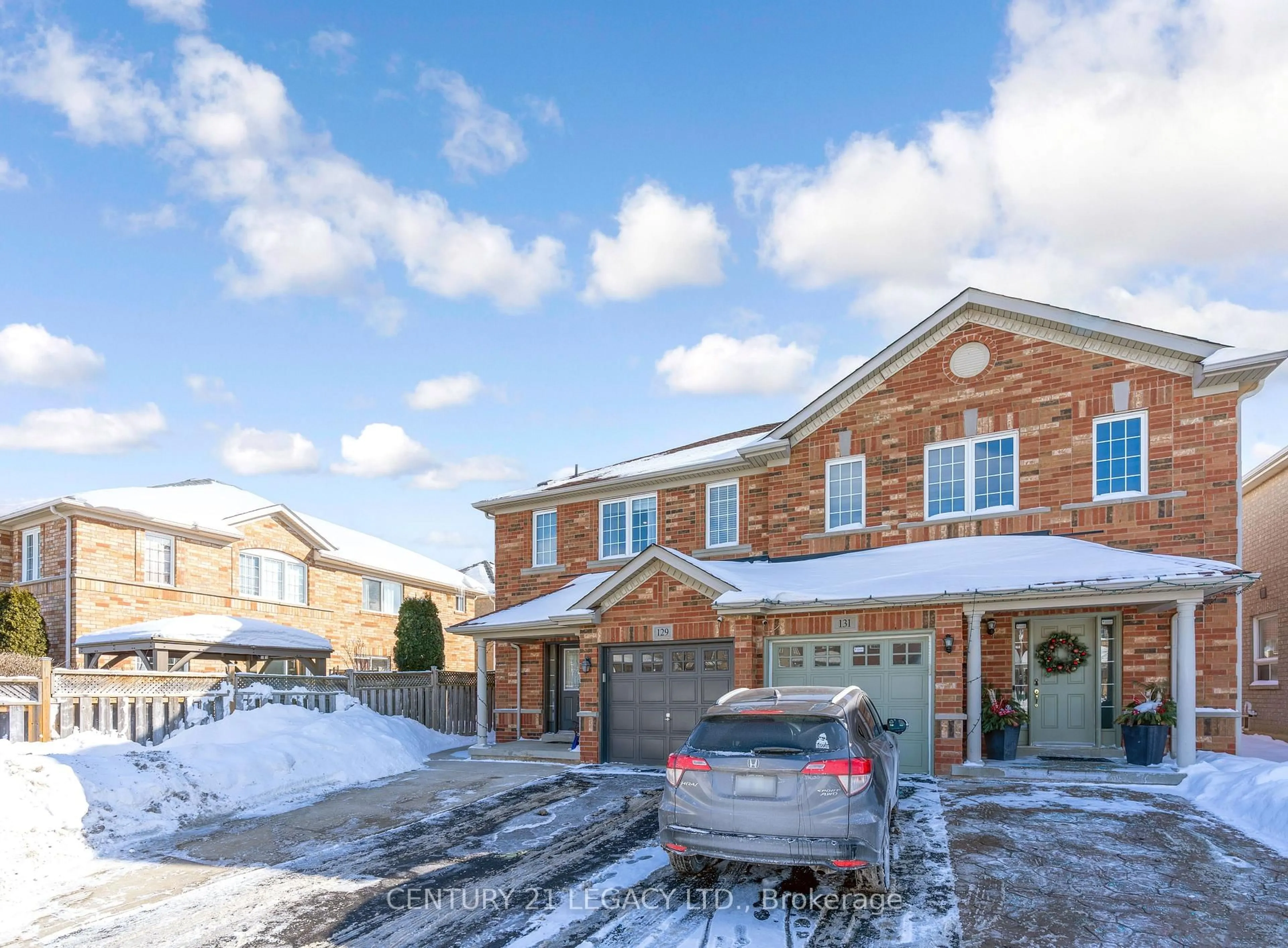 Home with brick exterior material, street for 129 Sugarhill Dr, Brampton Ontario L7A 3X4