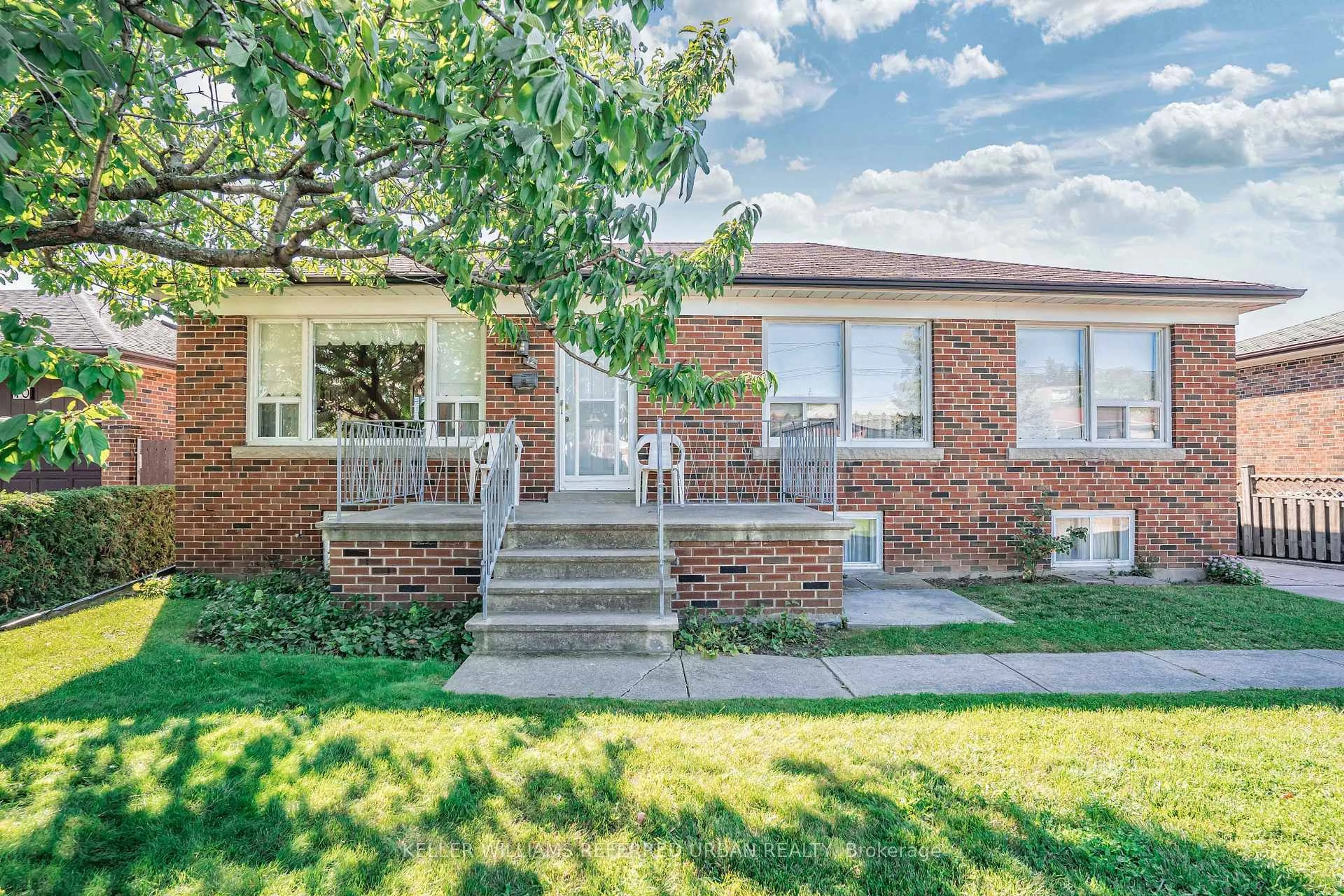 Home with brick exterior material, street for 12 Erie St, Toronto Ontario M6L 2P7