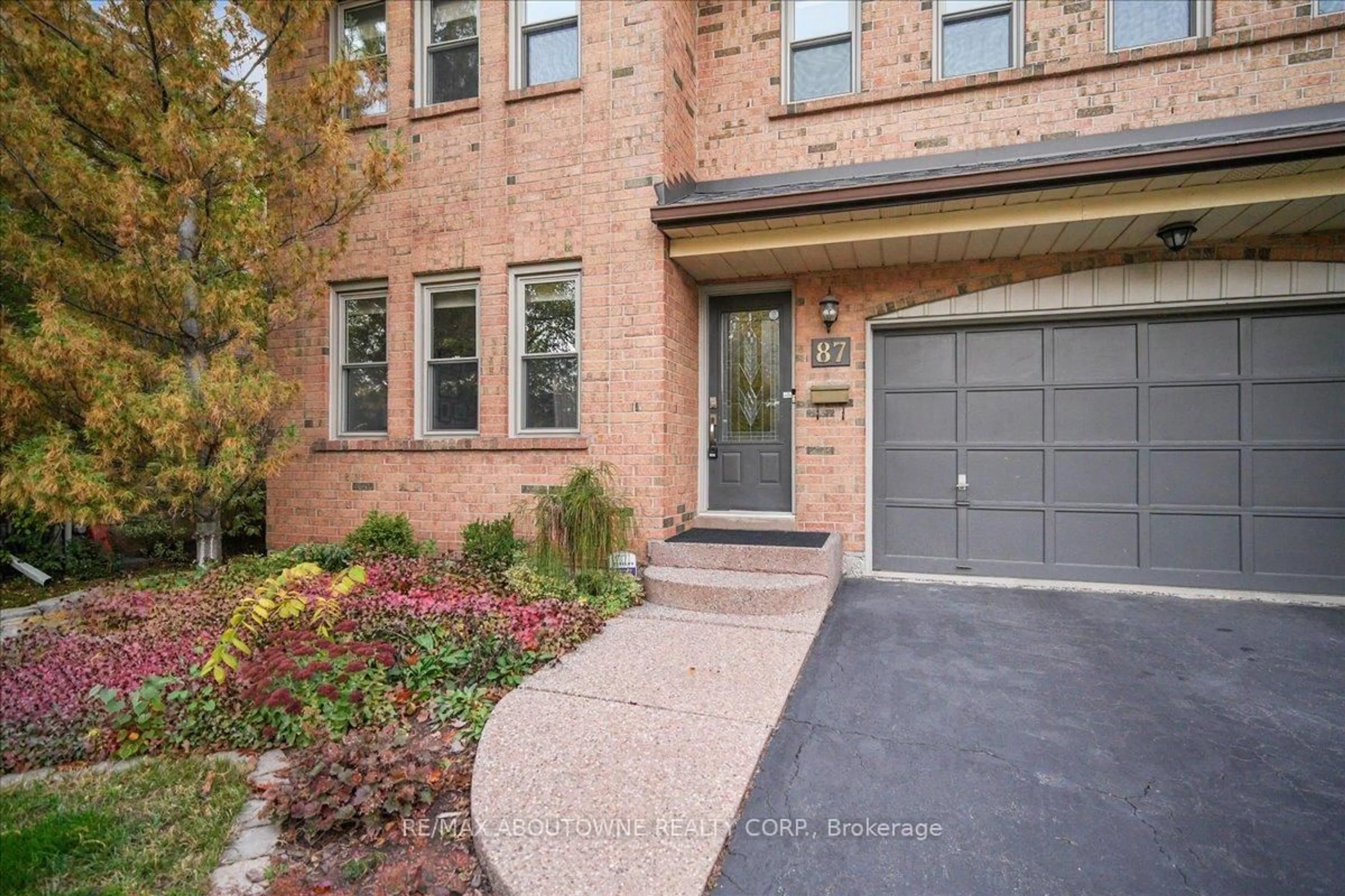 Home with brick exterior material, street for 87 River Oaks Blvd, Oakville Ontario L6H 3N4